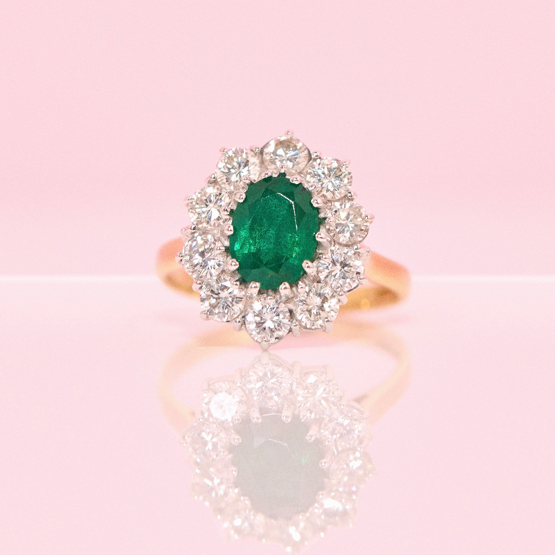 18ct gold emerald and diamond cluster ring