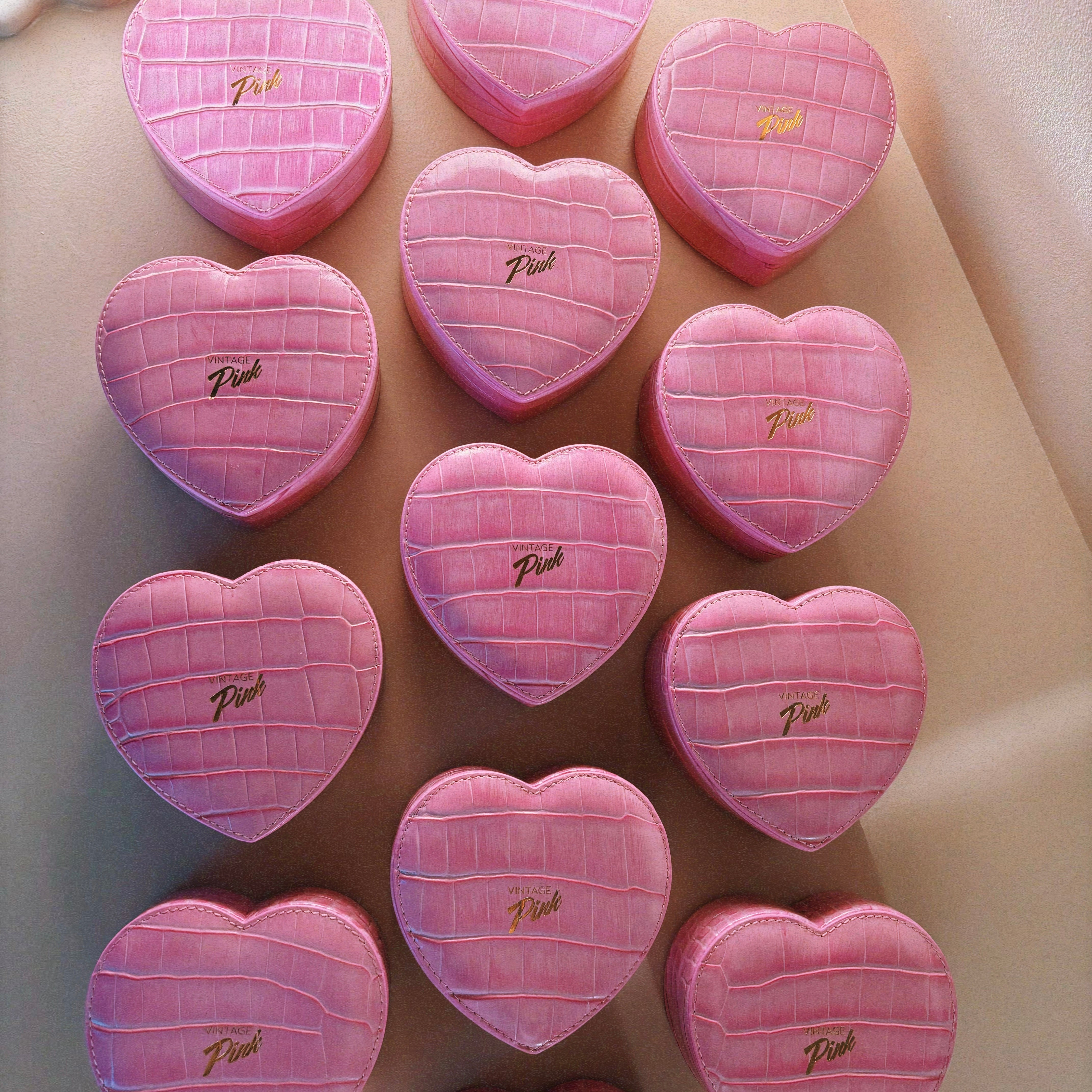 Heart-shaped pink faux croc and red velvet jewellery box