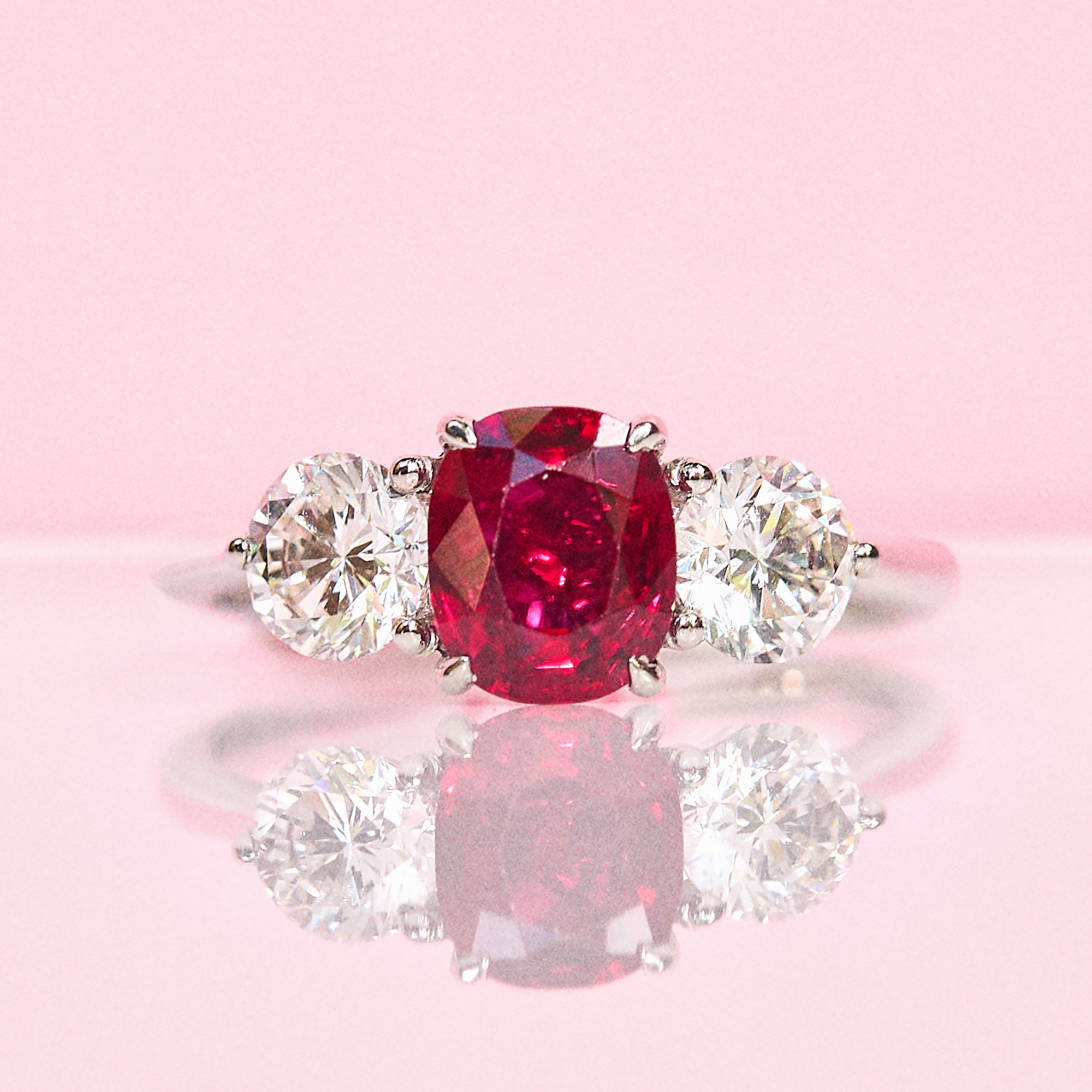 Platinum 1.50ct ruby and diamond three stone ring
