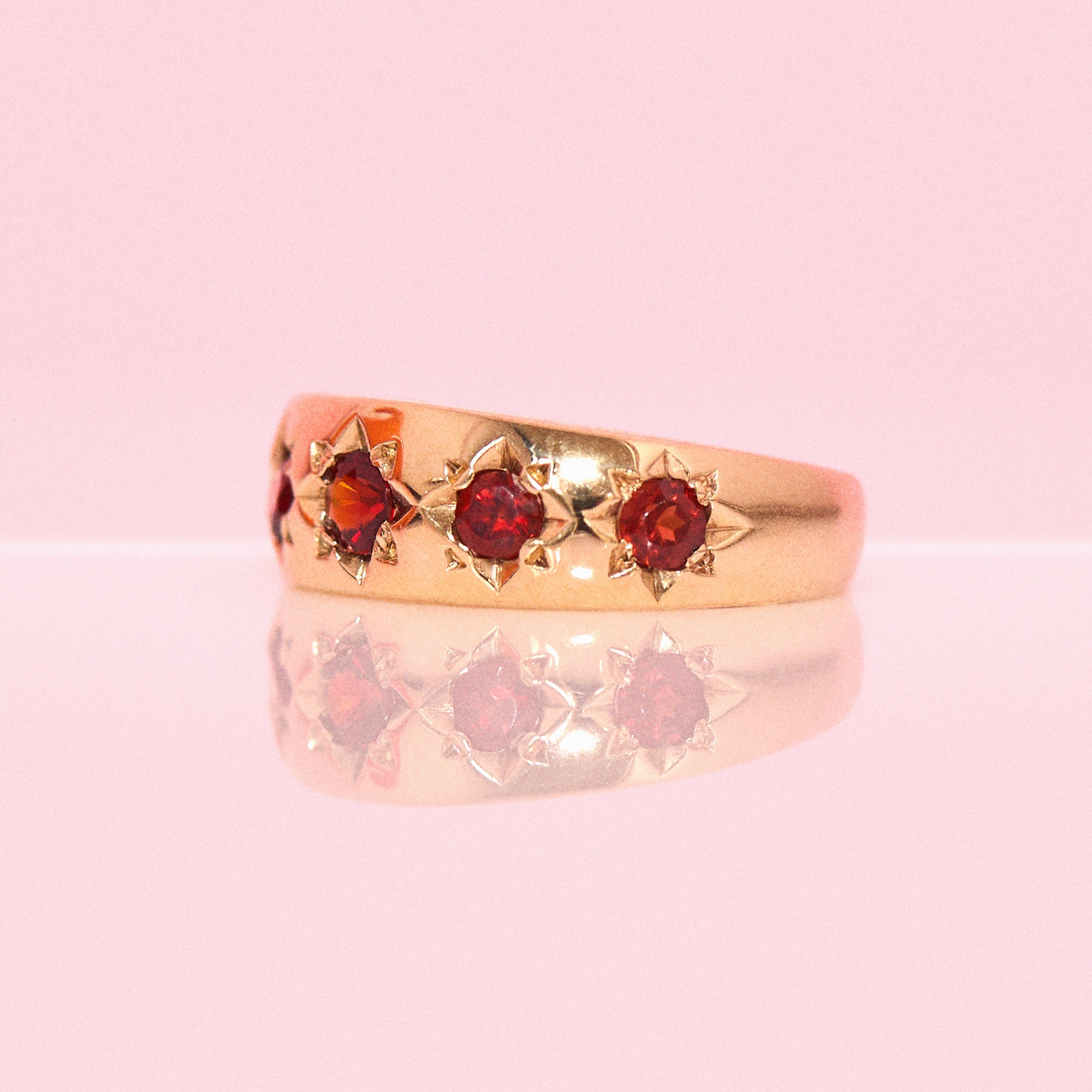 9ct gold garnet starburst ring from 1978