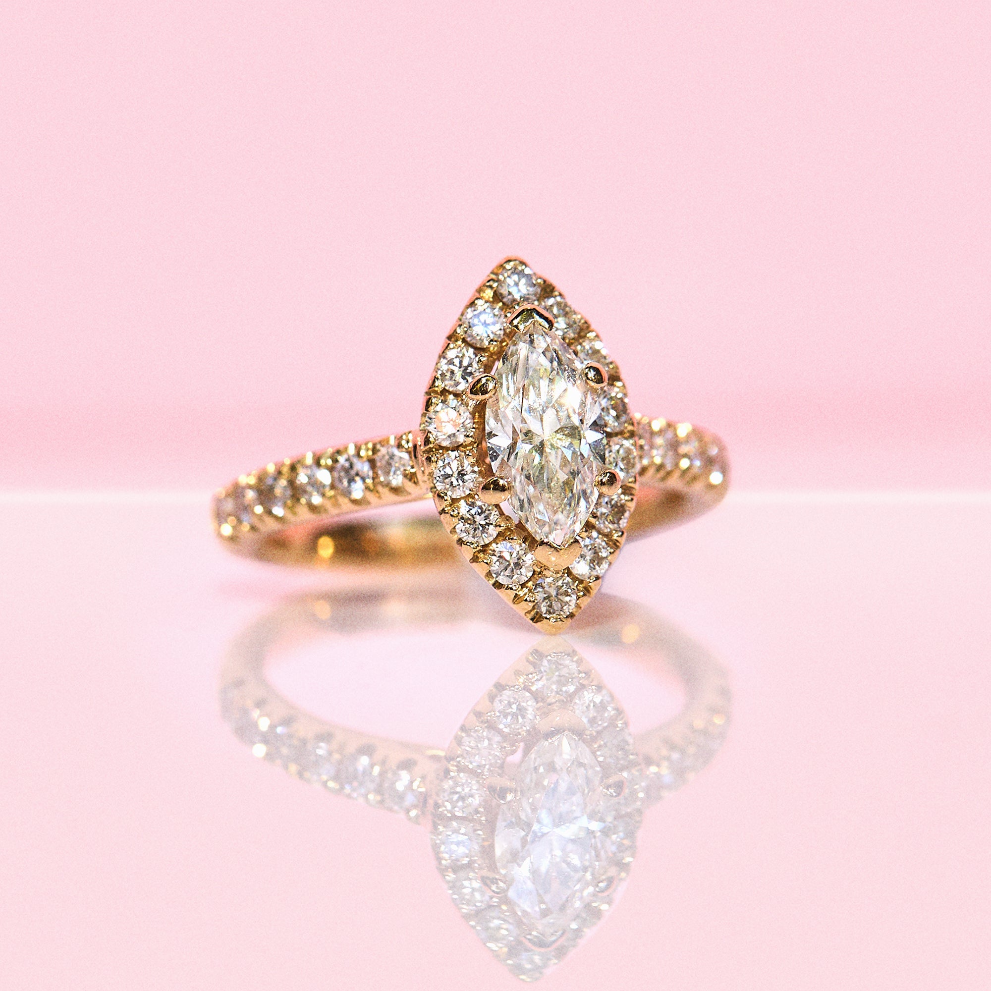 18ct gold 0.85ct marquise cut diamond halo ring