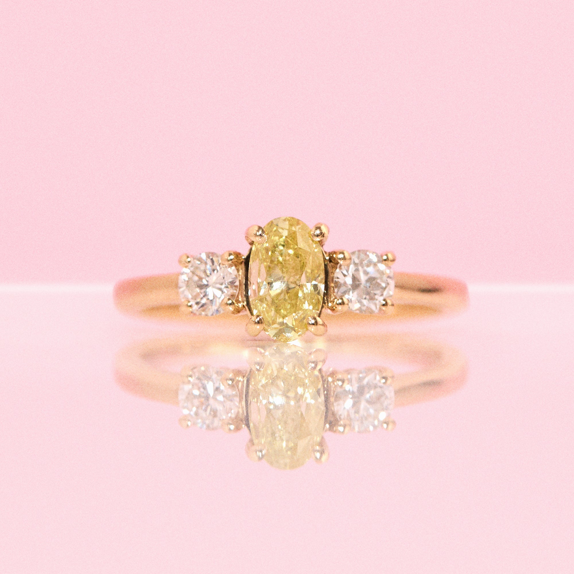 18ct gold 0.91ct yellow diamond three stone ring