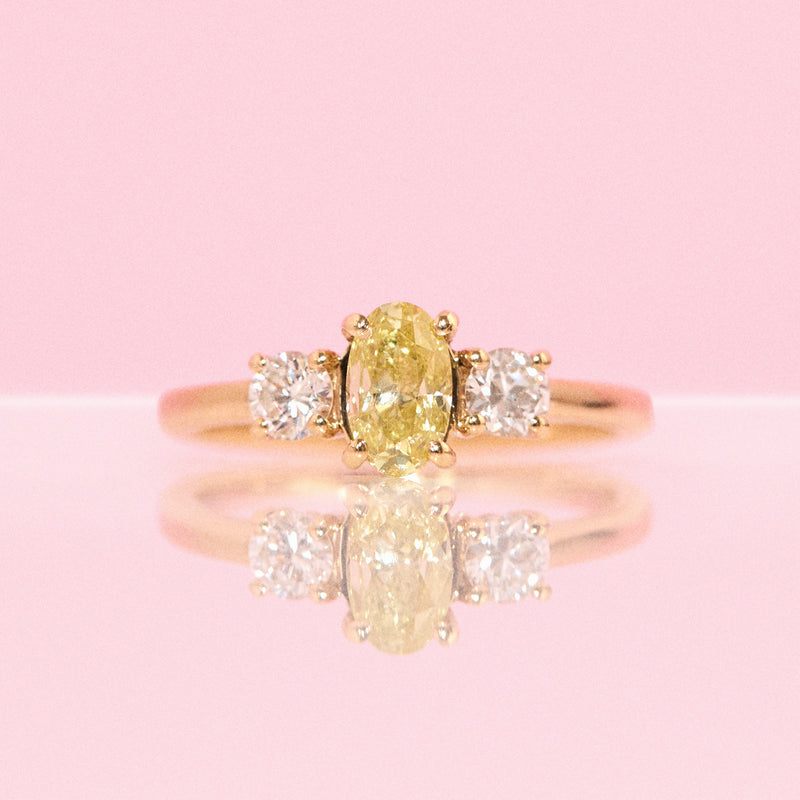 18ct yellow gold 0.91ct yellow diamond three stone ring
