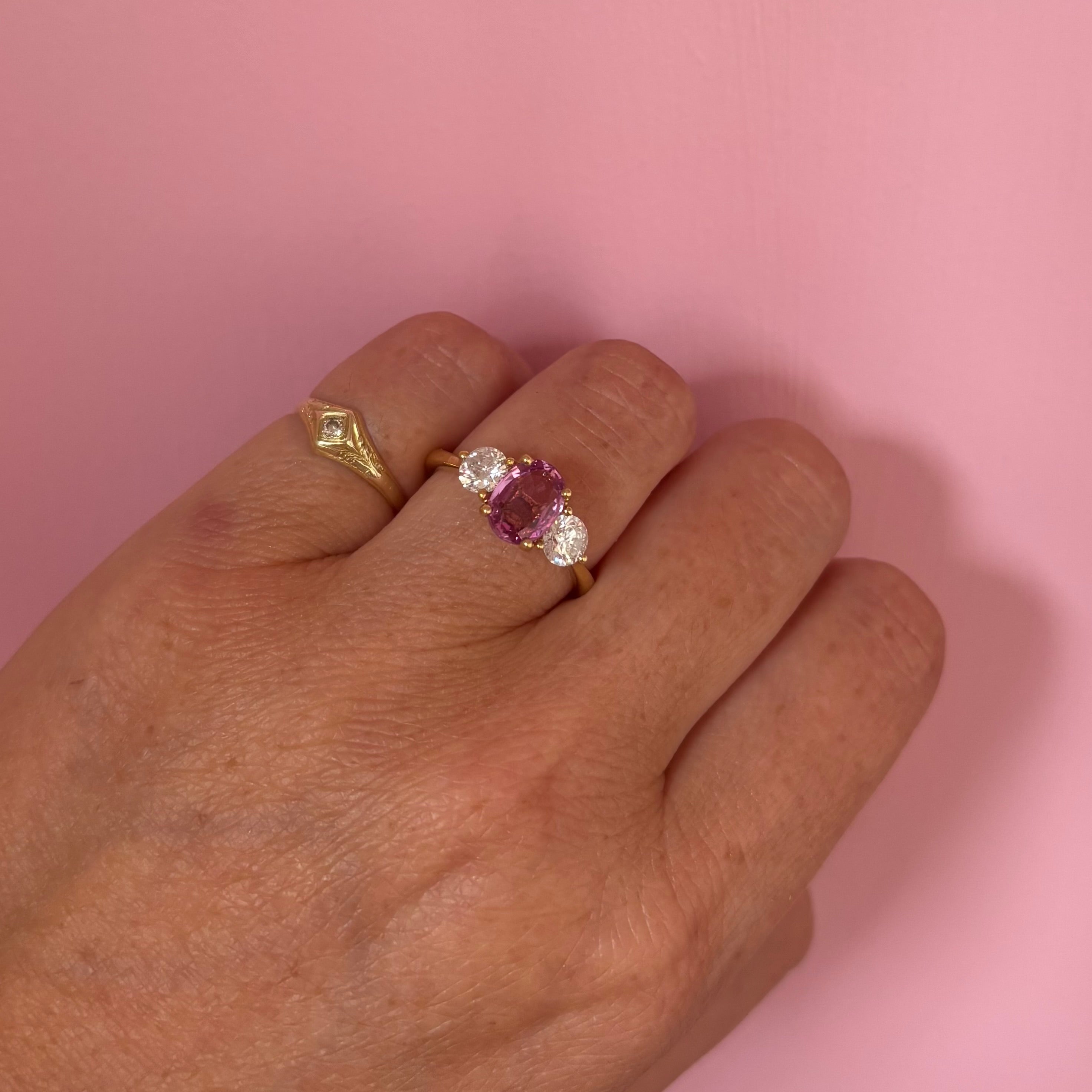 18ct gold 1.46ct pink sapphire and 0.84ct diamond three stone ring