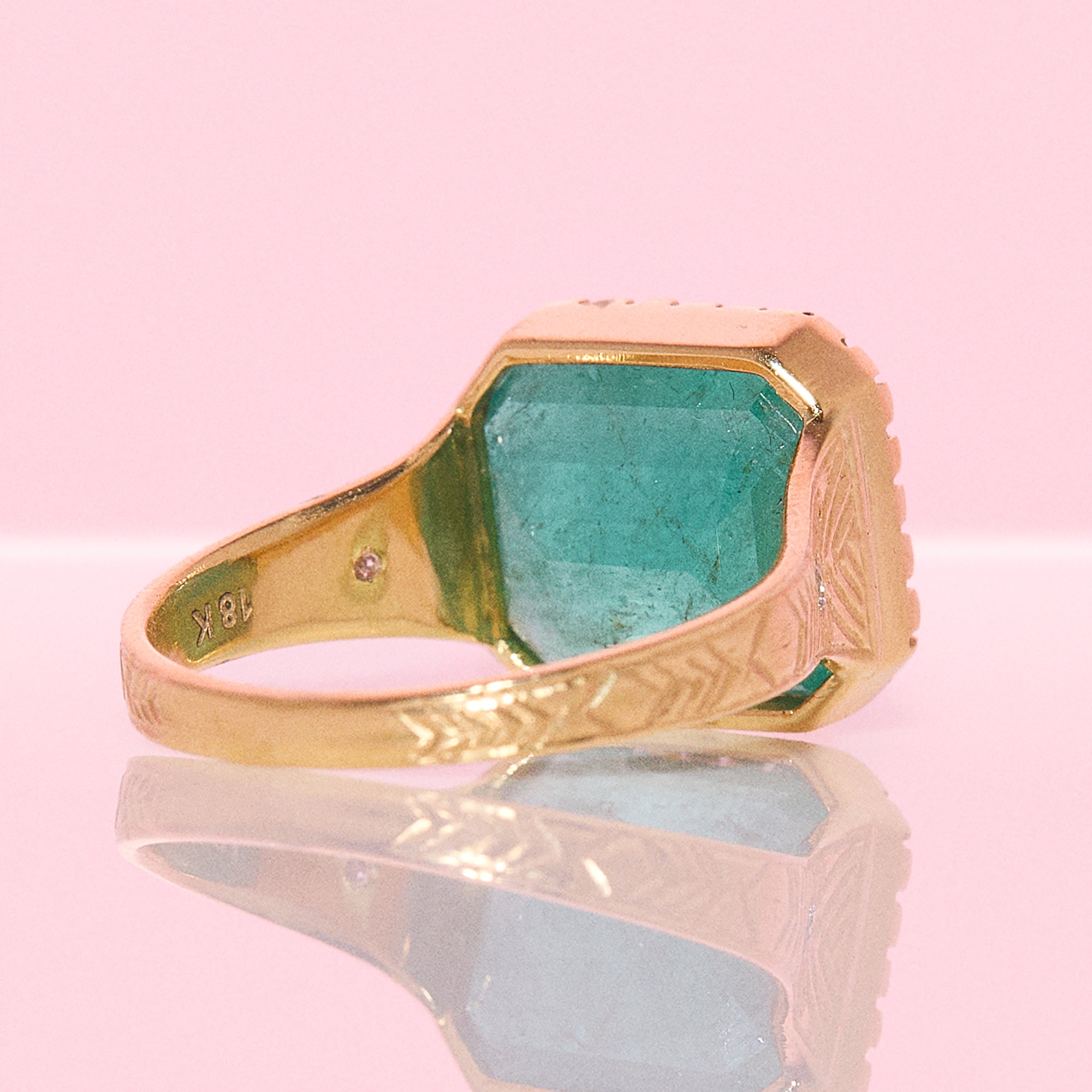 14ct gold 10.80ct Asscher cut emerald and diamond ring with engraved shoulders