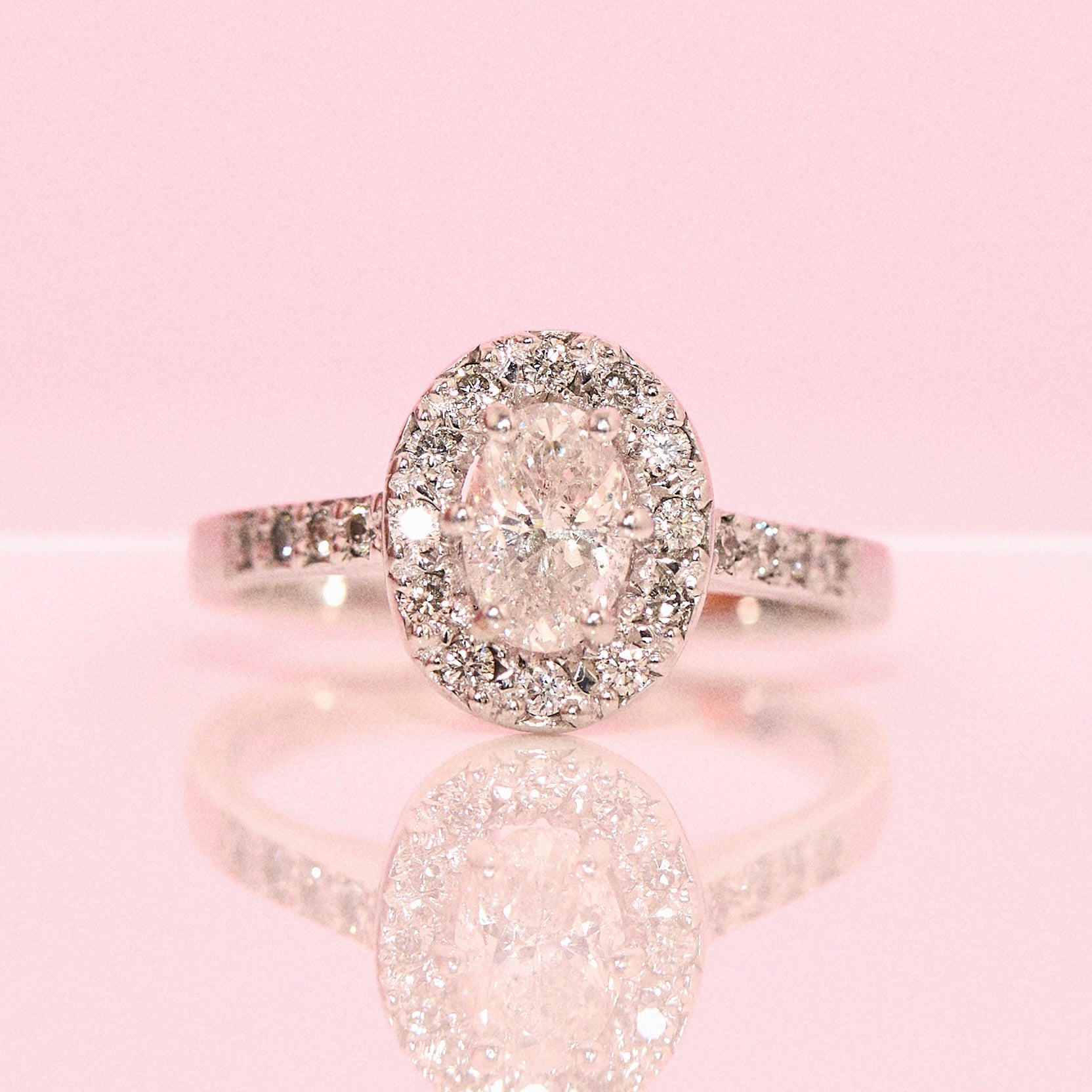 18ct white gold 0.75ct oval diamond cluster half-eternity ring