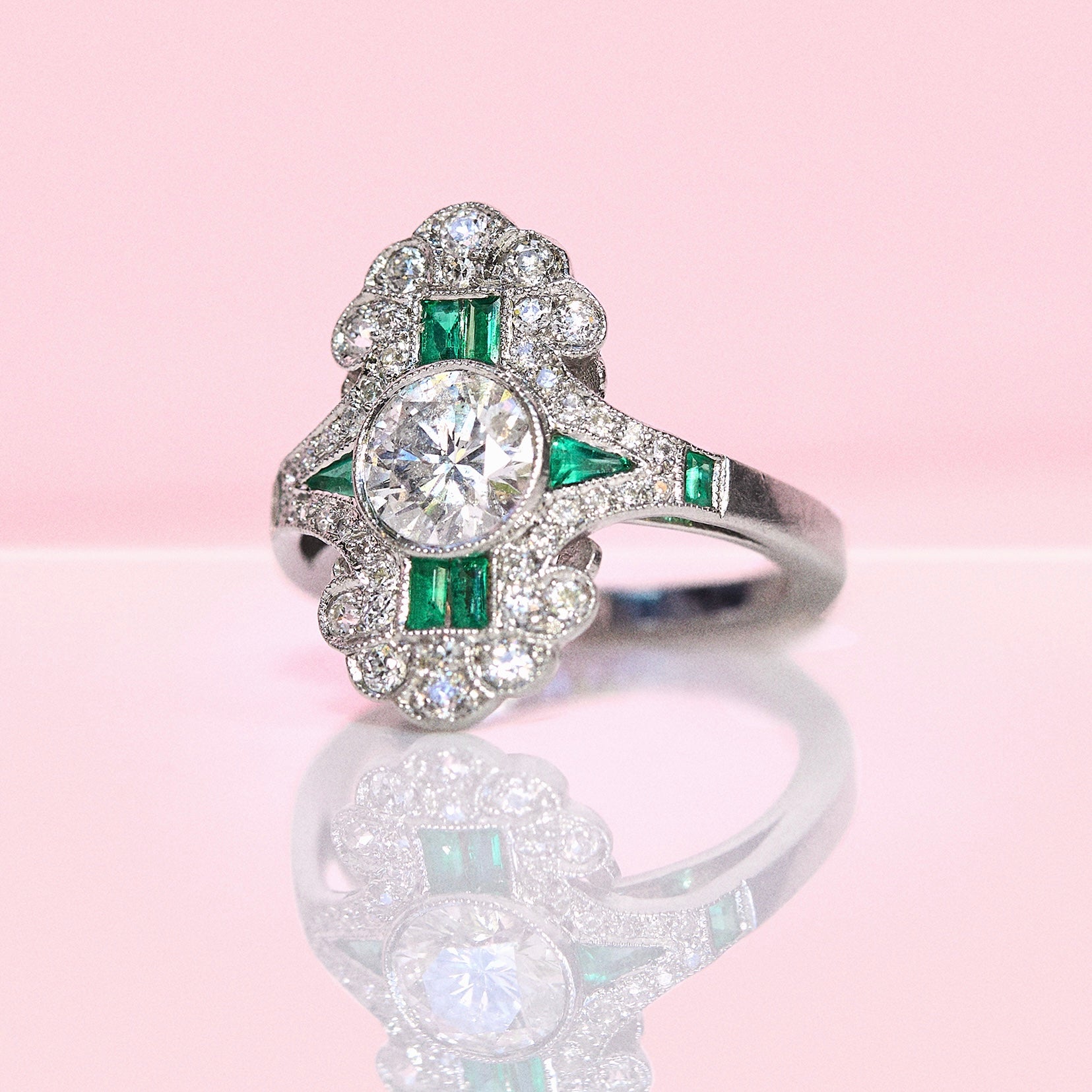 18ct white gold emerald and diamond fancy cluster ring