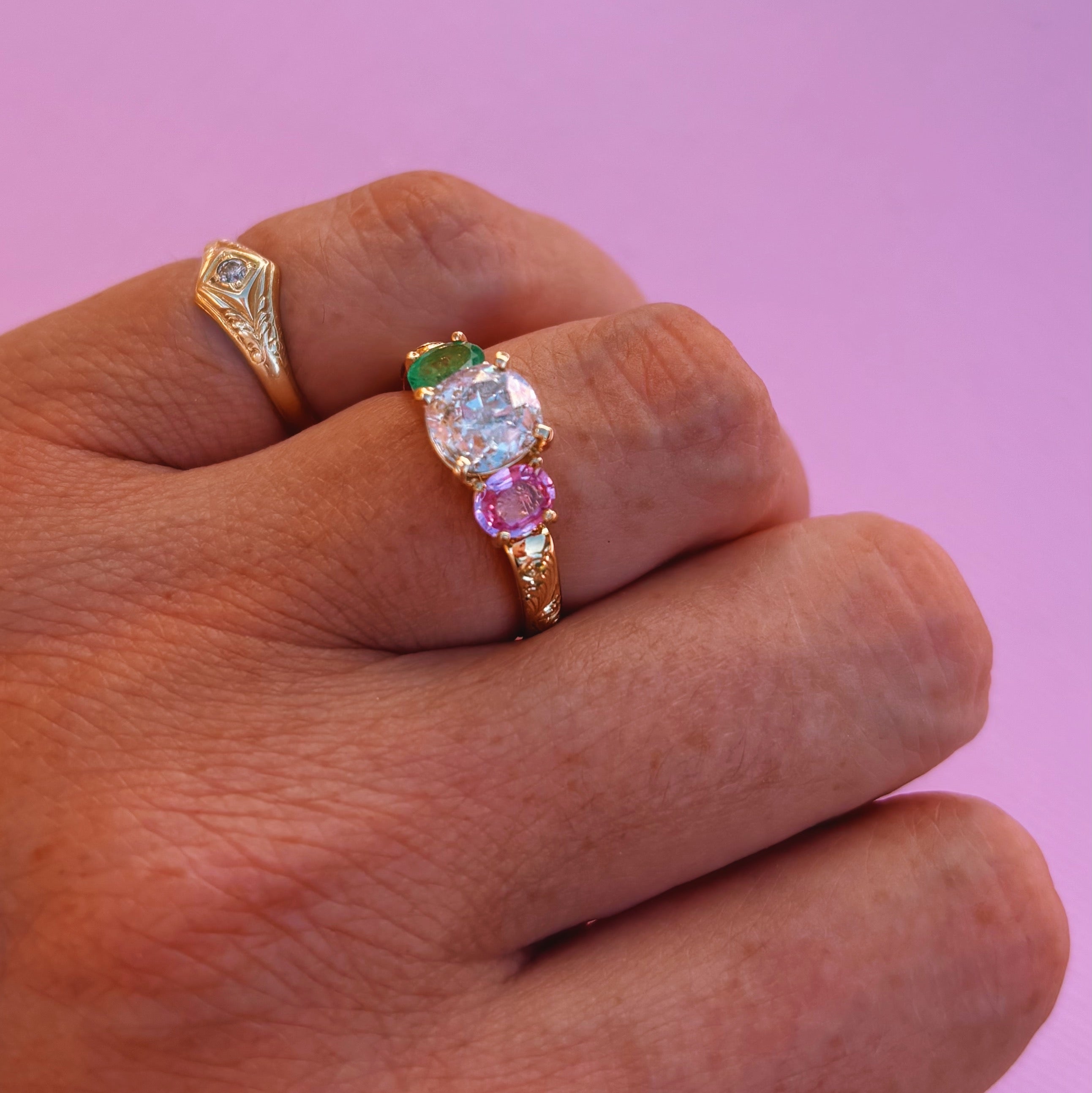 18ct yellow gold 1.569ct old cut vintage diamond, emerald and pink sapphire ‘Two Become One’ engraved ring