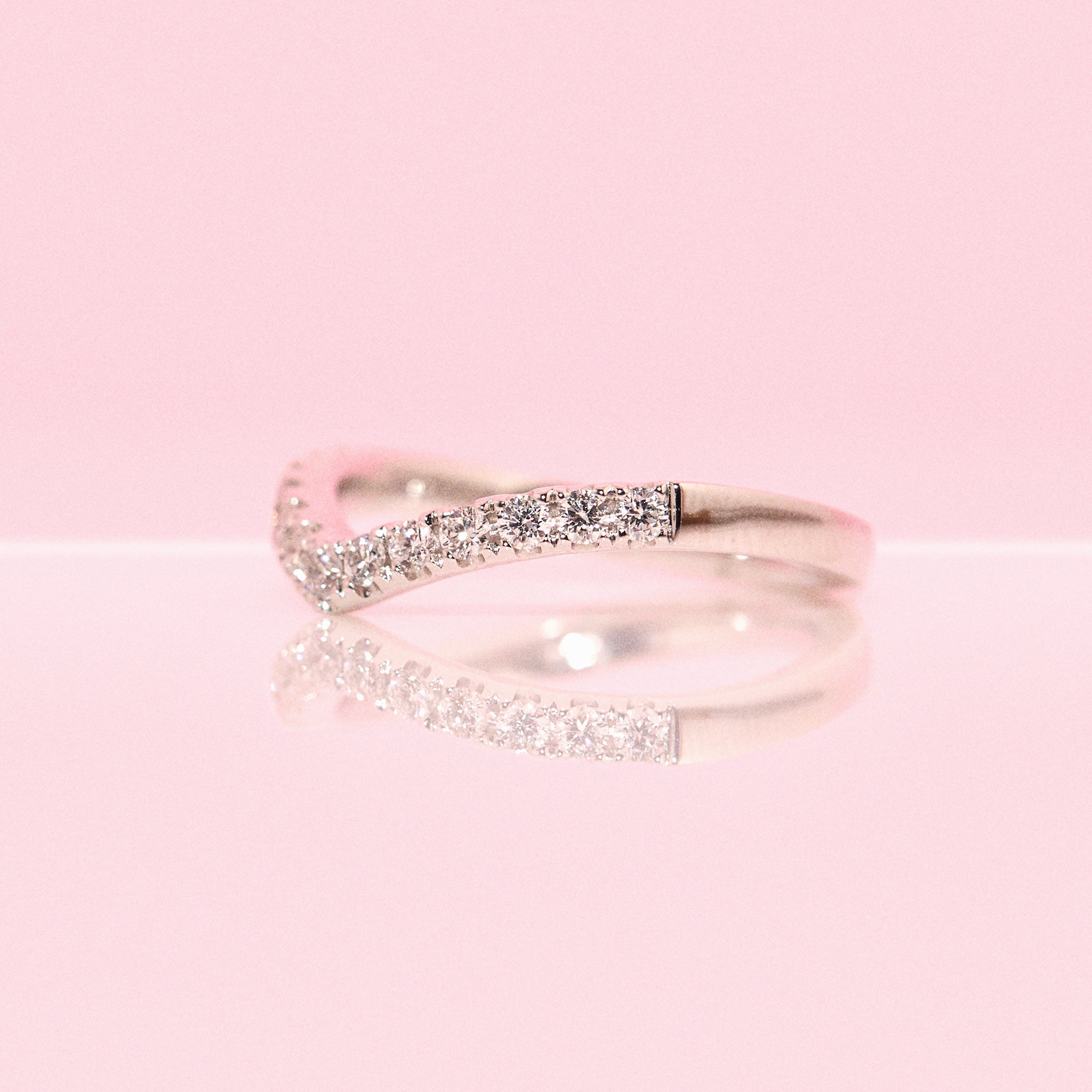 Platinum curved diamond half-eternity ring