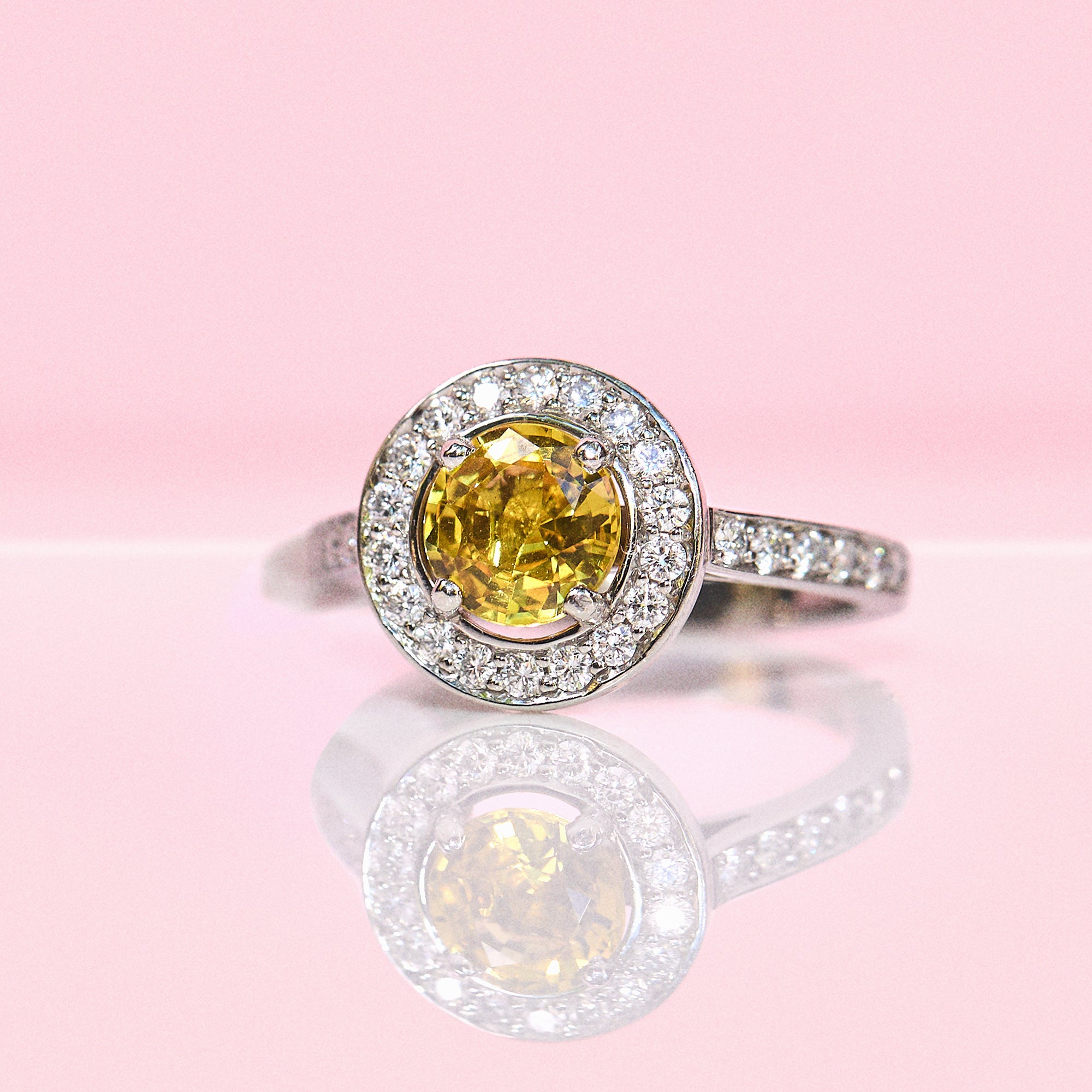 Platinum 1.05ct yellow sapphire and diamond halo ring