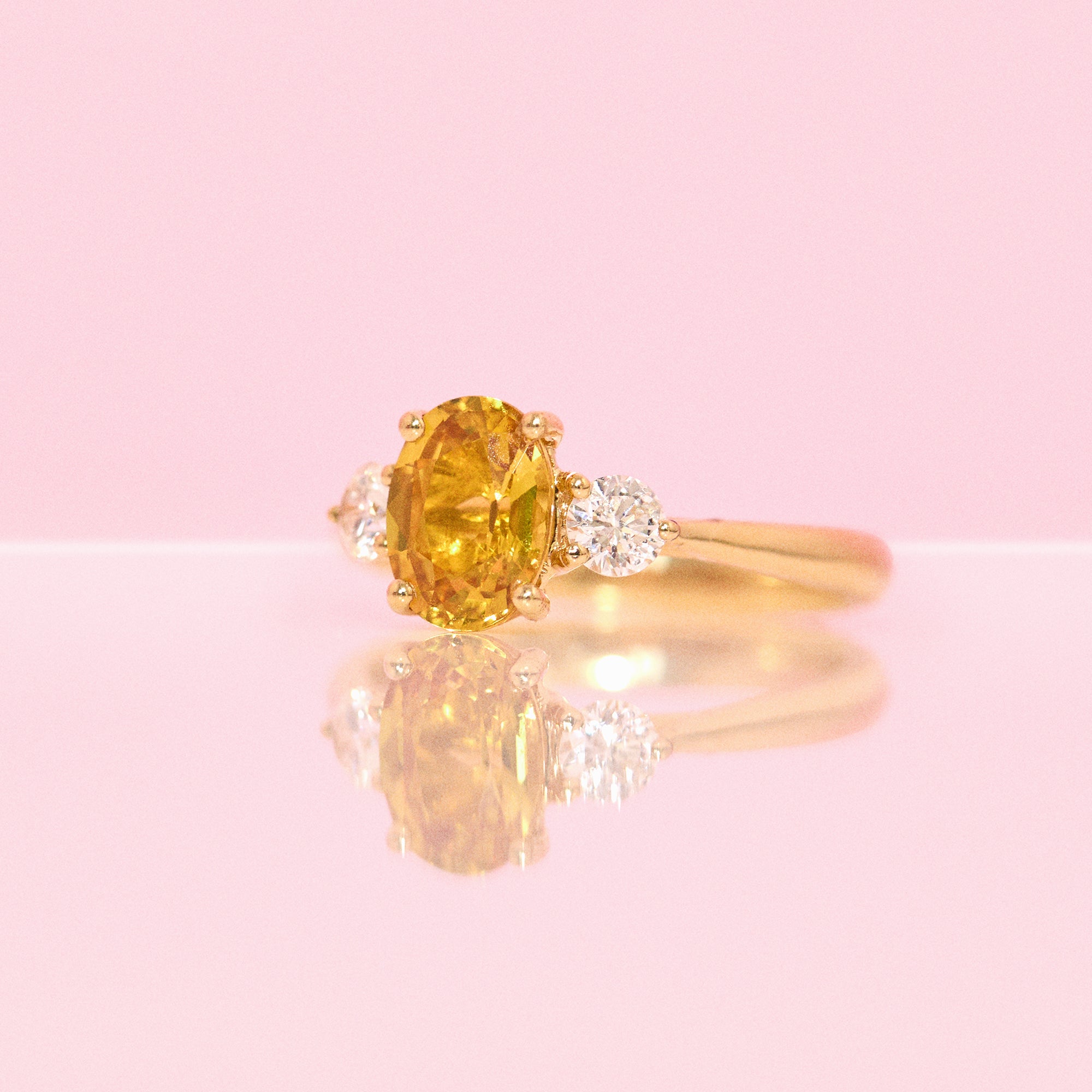 18ct gold yellow sapphire and diamond three stone ring