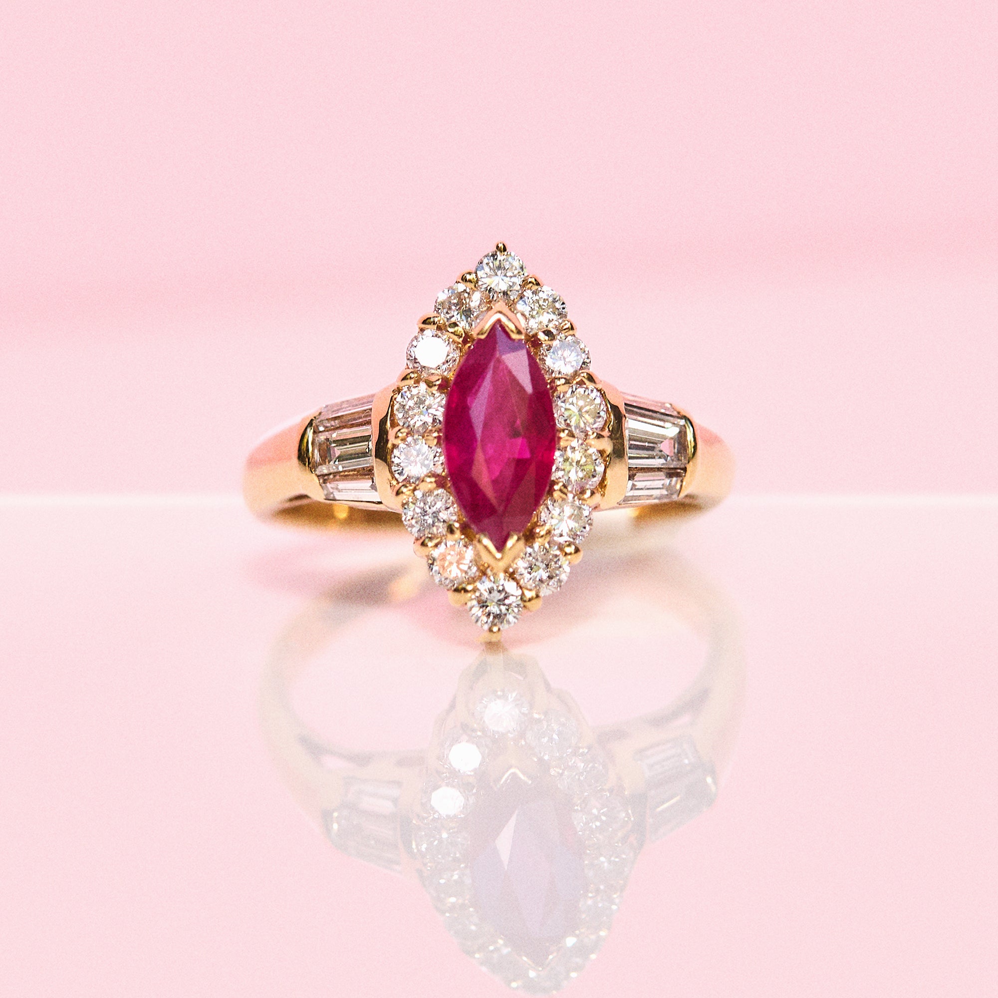 18ct gold 1.08ct marquise cut ruby and diamond cluster ring