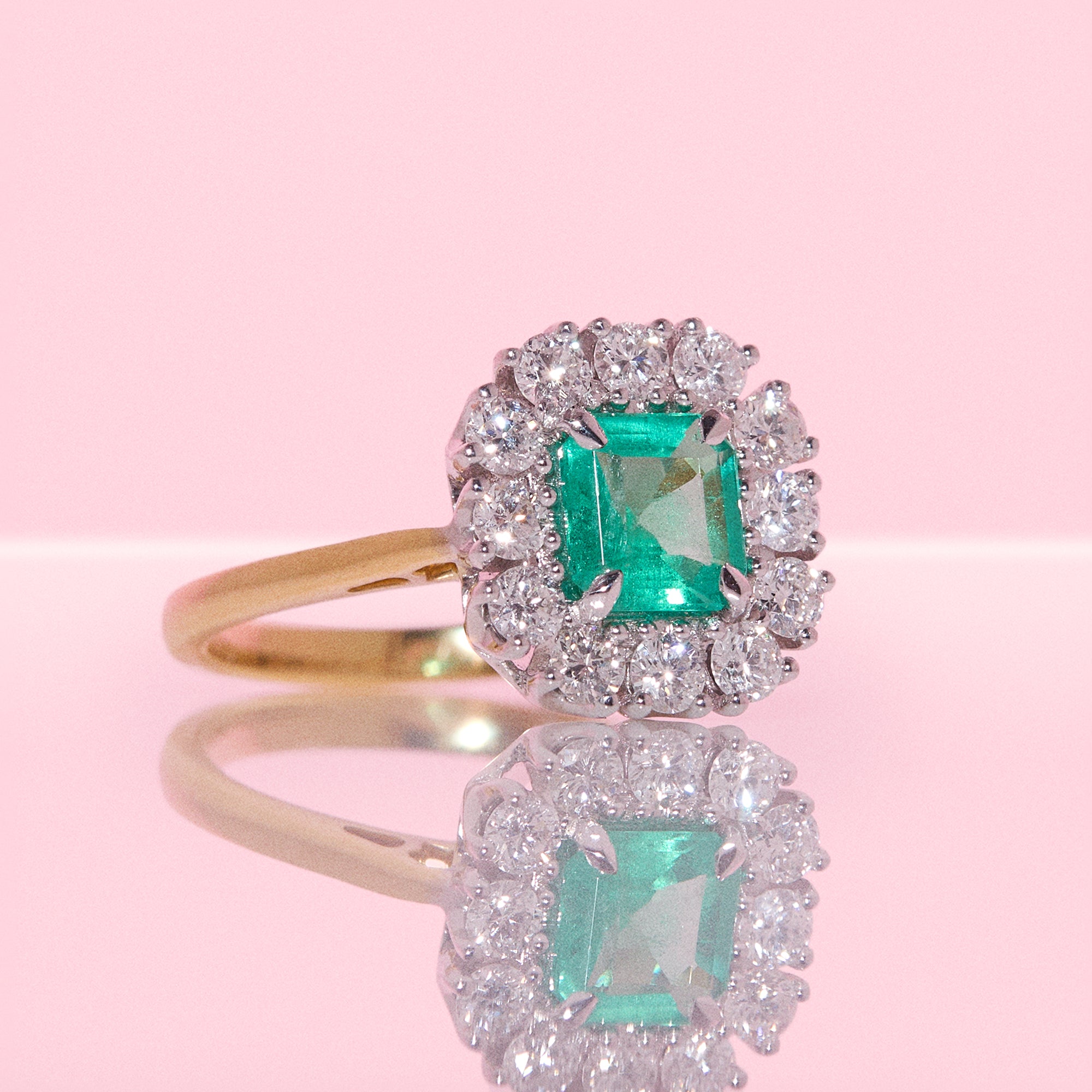 18ct gold emerald and diamond cluster ring