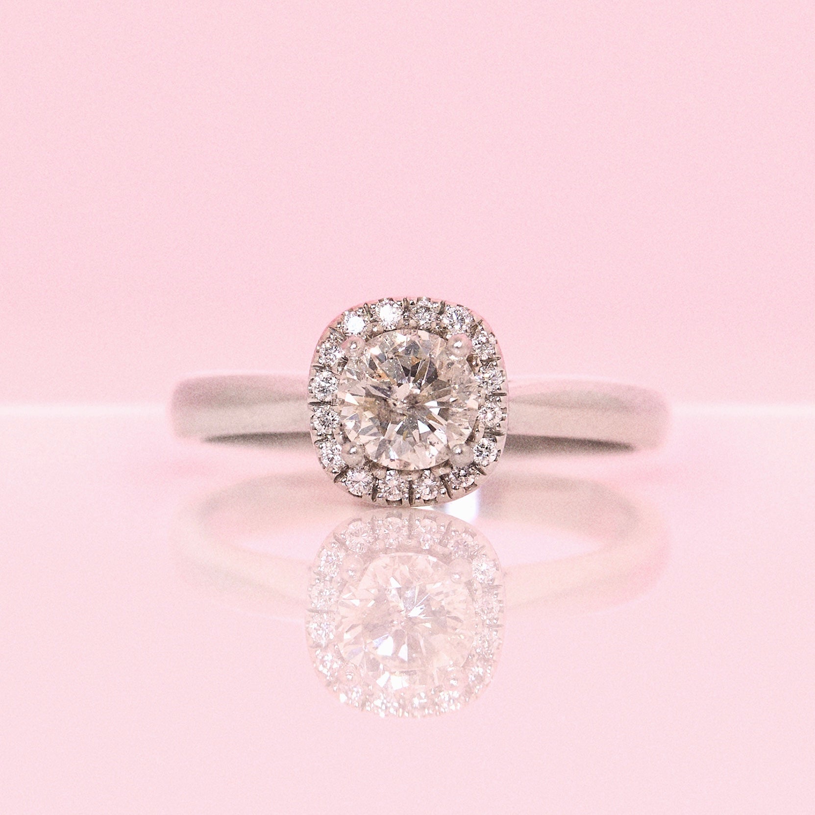 Platinum 0.70ct diamond halo ring