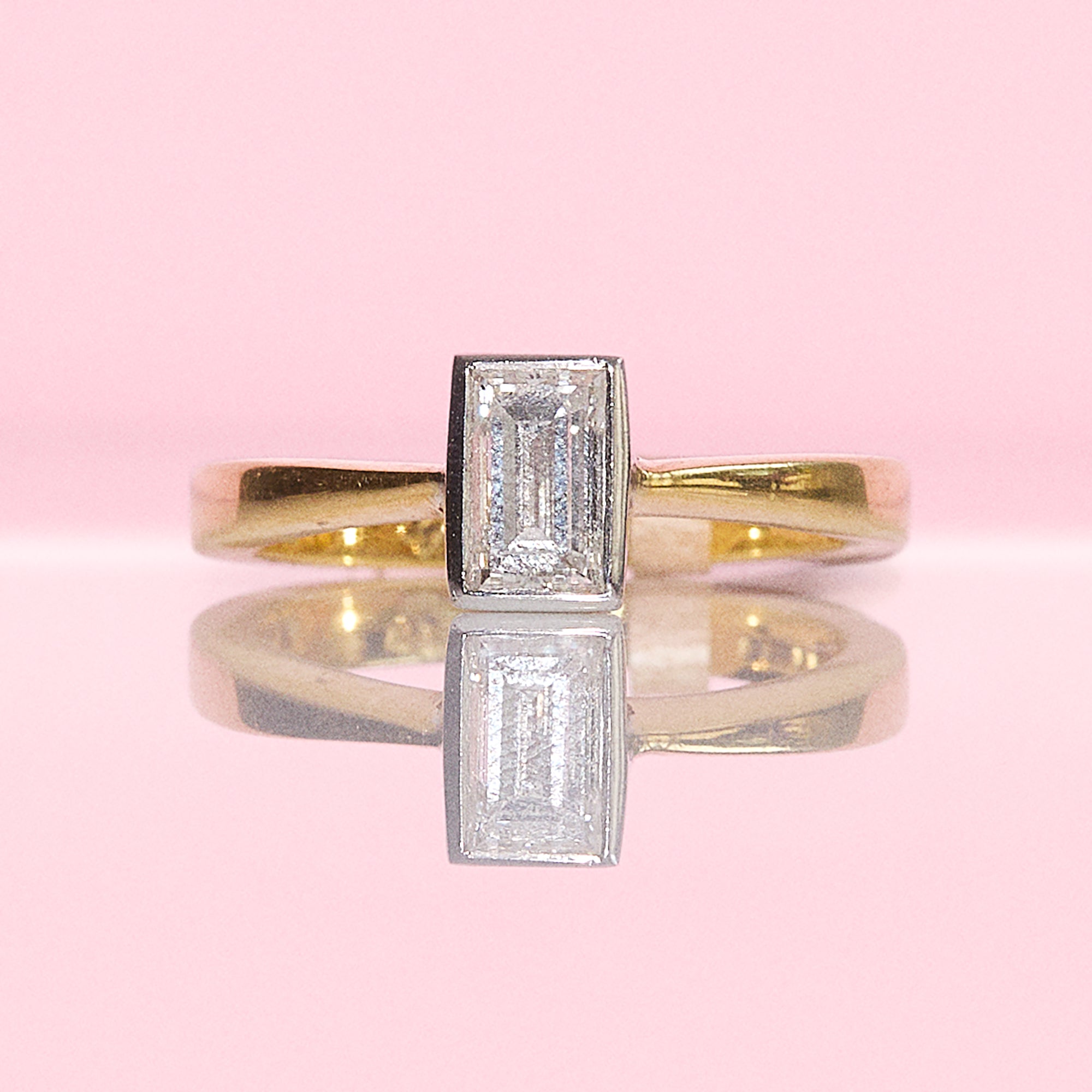 18ct gold 0.71ct emerald cut bezel set diamond ring