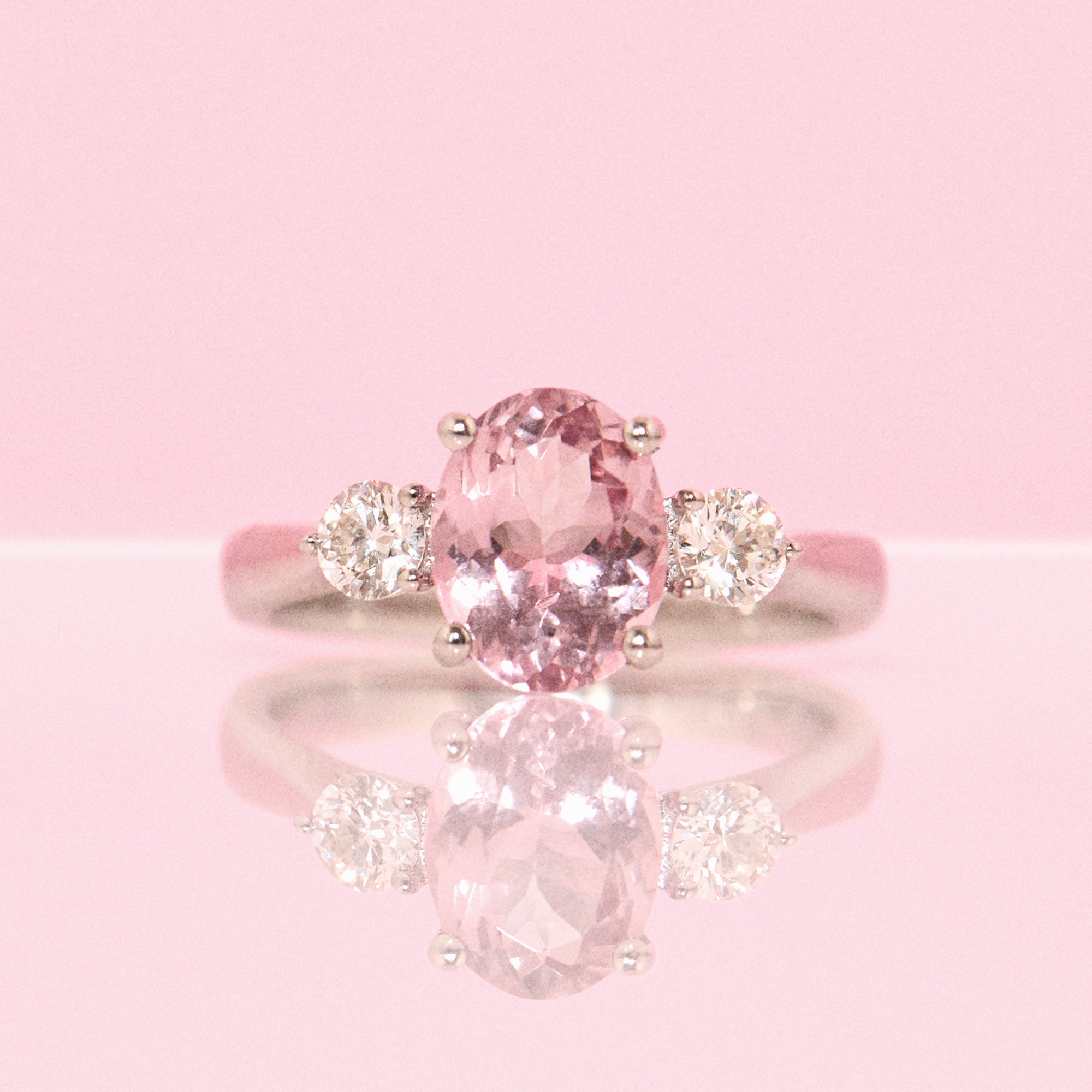 Platinum morganite and diamond three stone ring