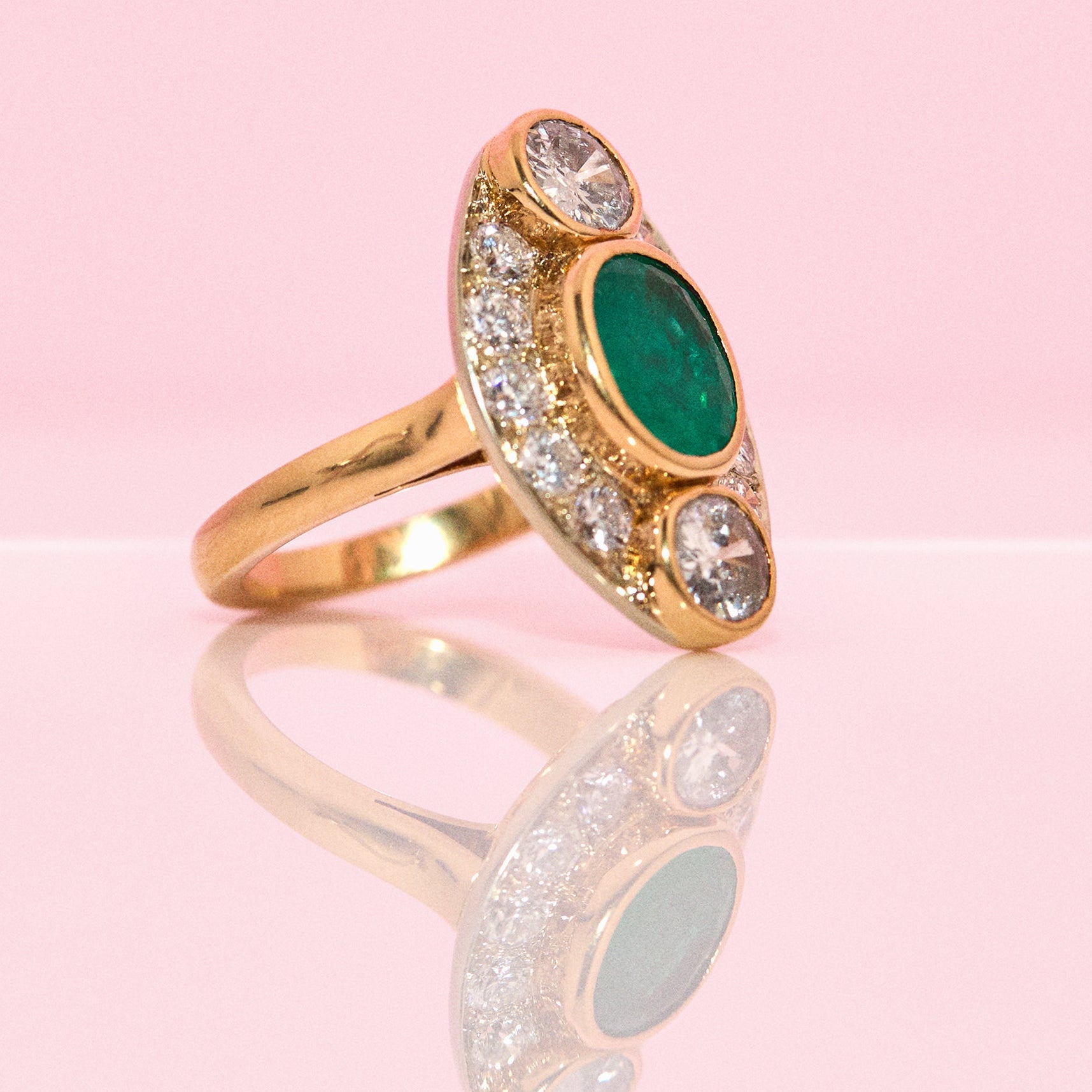 Vintage 18ct gold 2.9ct emerald and 2.5ct diamond french ring