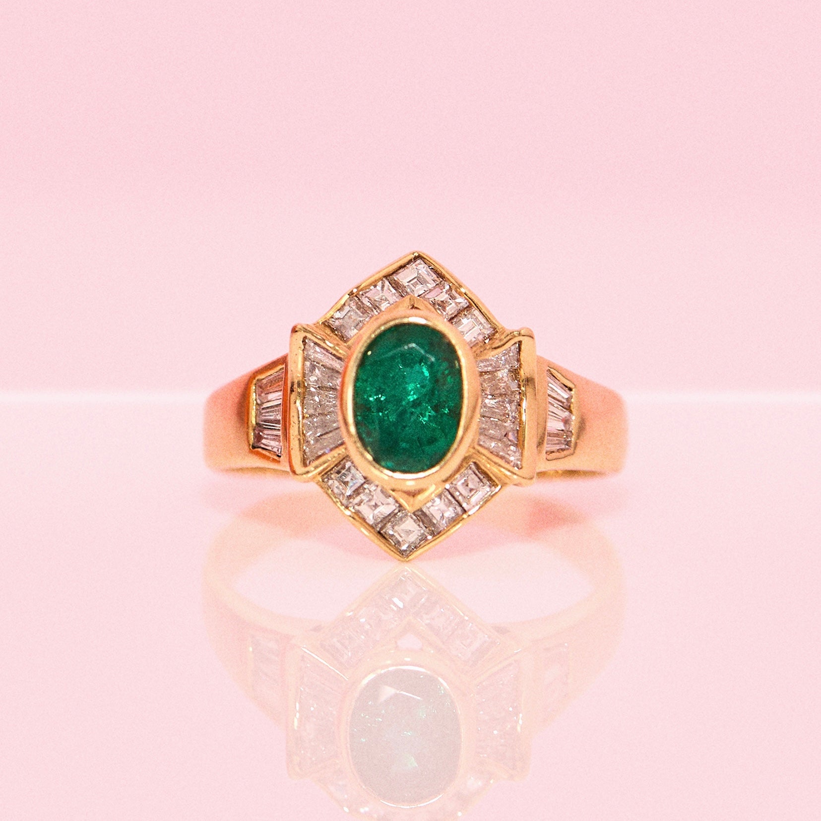 18ct gold emerald and baguette diamond ring