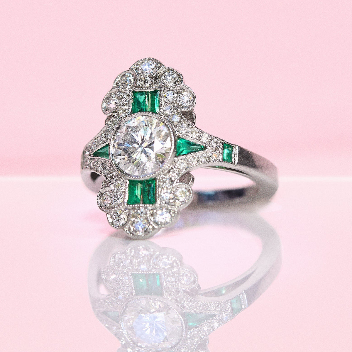 Vintage 18ct white gold emerald and diamond fancy cluster ring