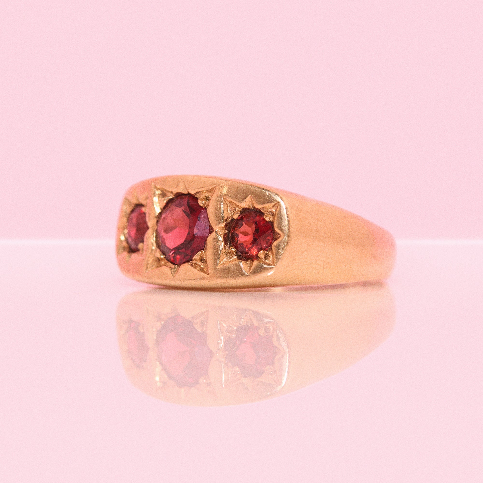 9ct gold three stone garnet ring