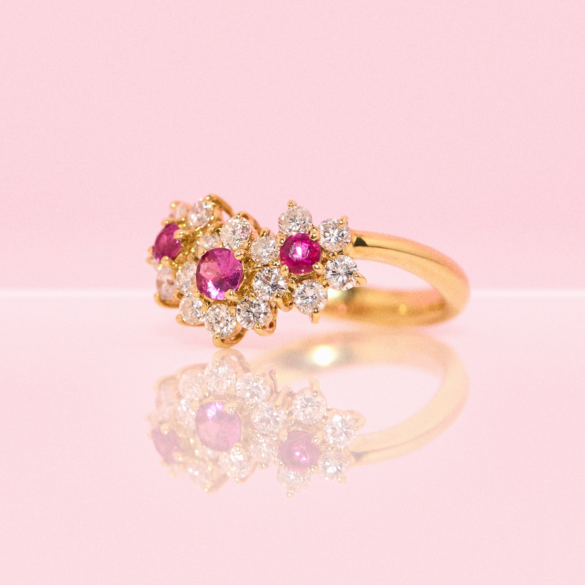 18ct gold ruby and diamond flower ring