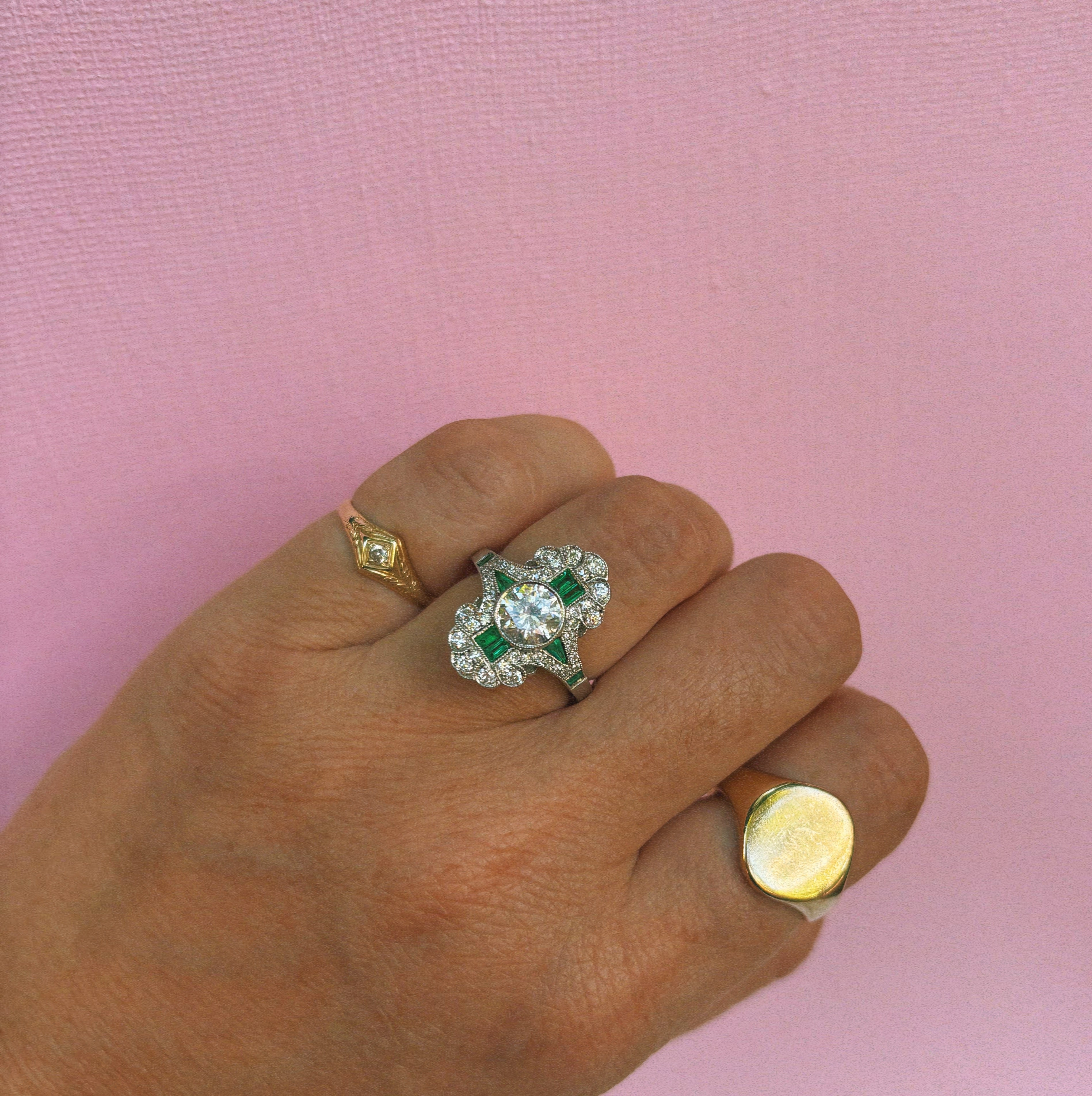 18ct white gold emerald and diamond fancy cluster ring