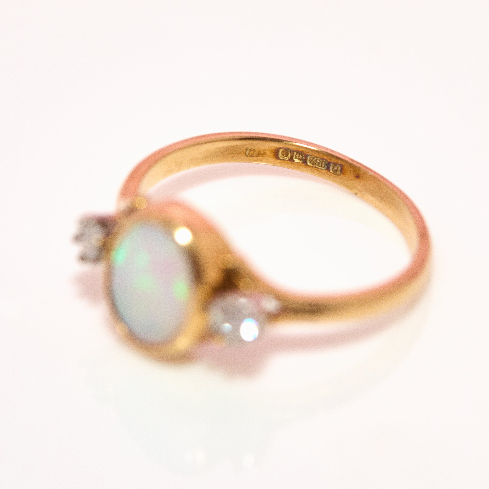 18ct gold opal and diamond three stone ring