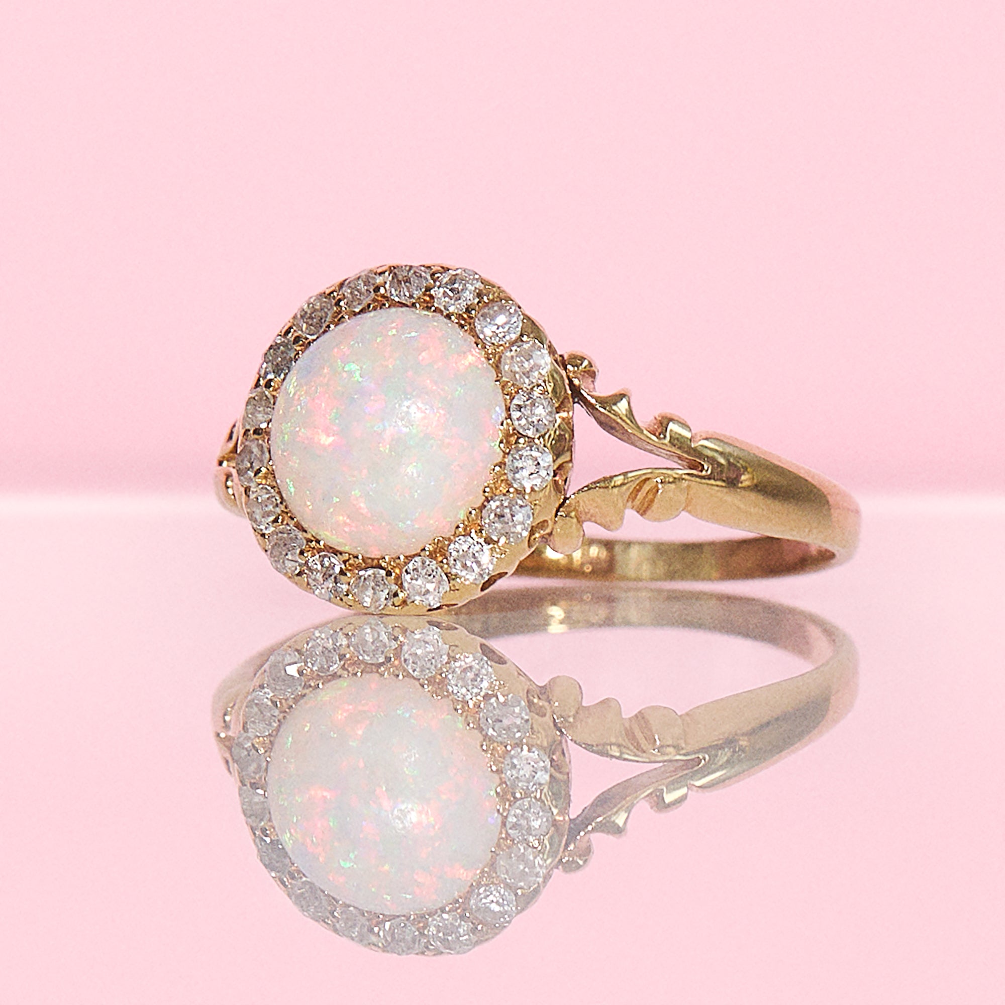 18ct gold round opal and diamond cluster ring
