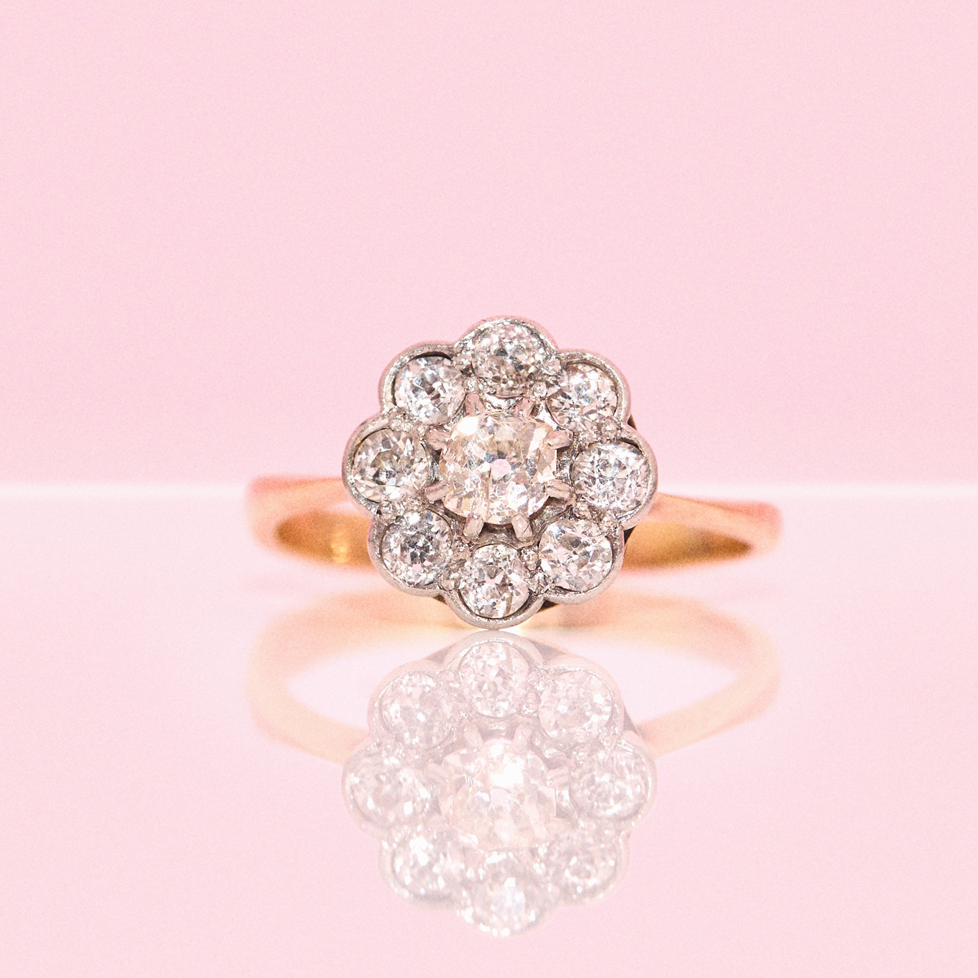 18ct gold old cut diamond flower ring from 1931