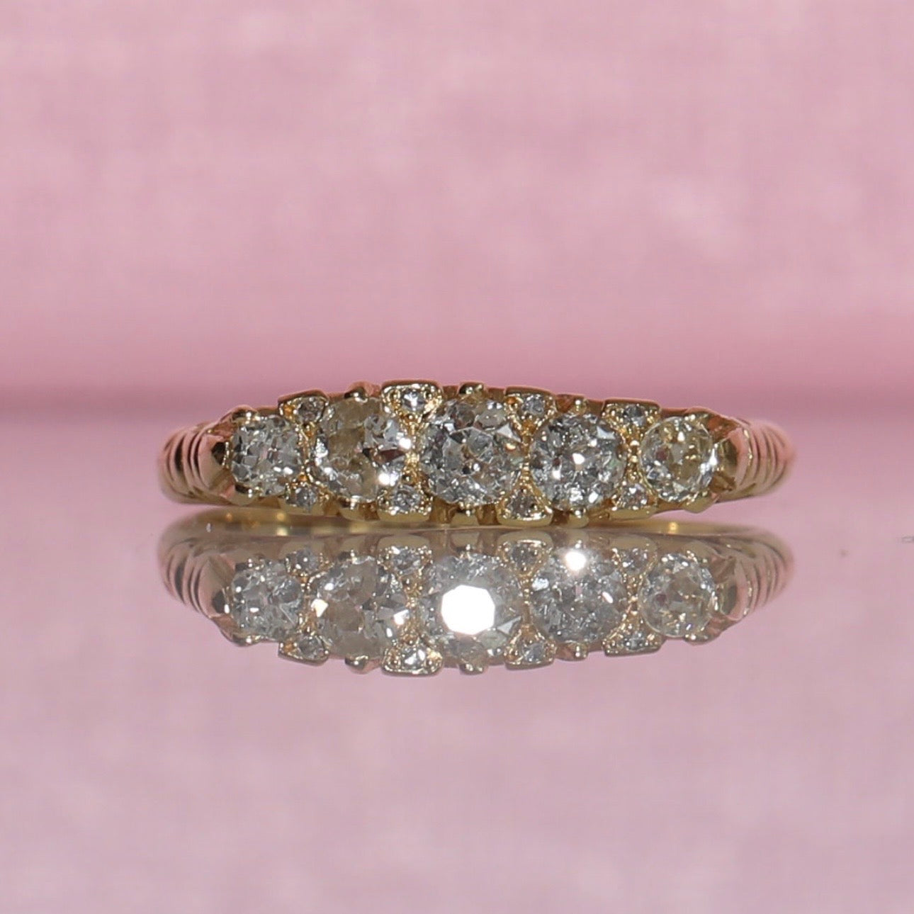 18ct gold old cut diamond five stone carved ring