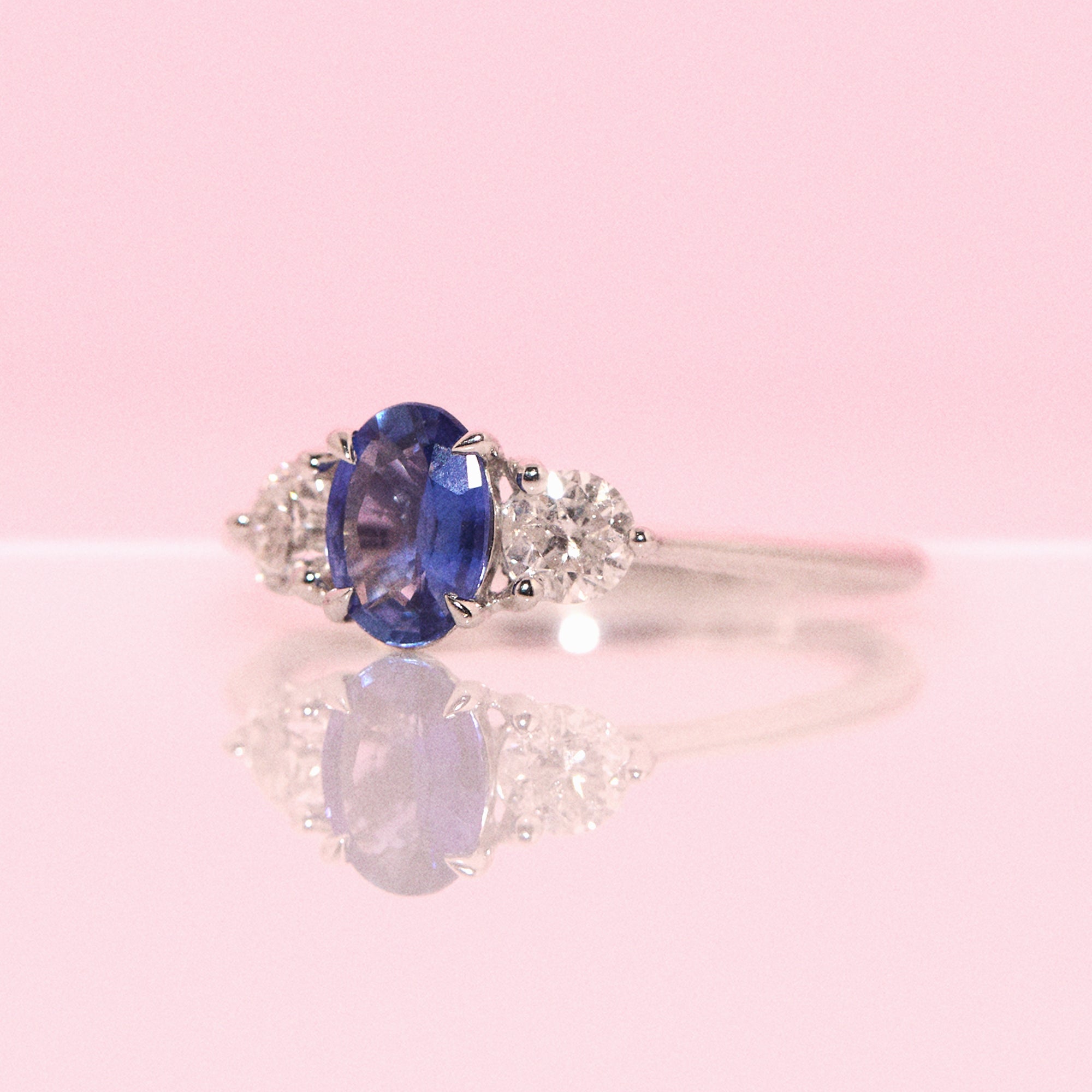 Platinum 0.84ct blue sapphire and diamond three stone ring (made to order)