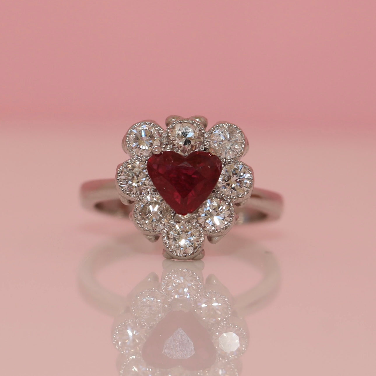 Platinum heart-shaped ruby and diamond vintage earring conversion ring