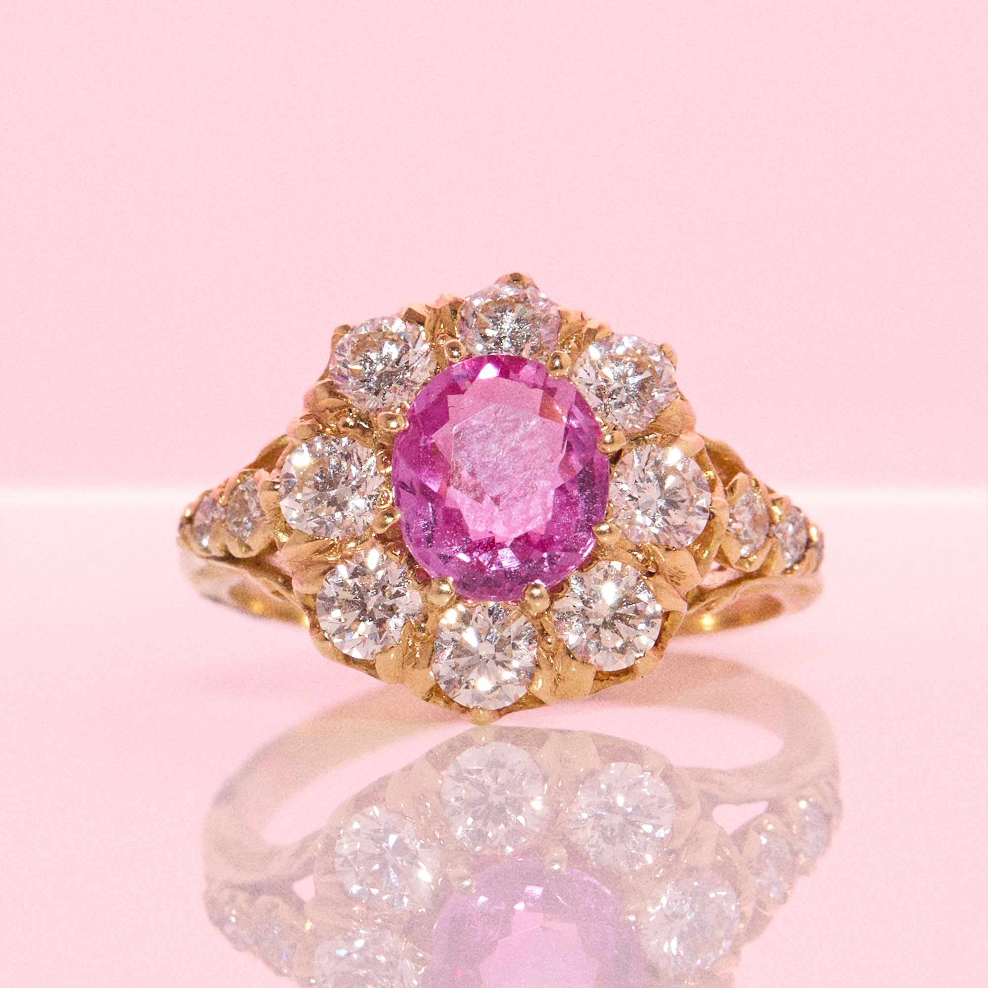 Vintage 18ct gold 1.16ct oval pink sapphire and 1.0ct diamond cluster ring