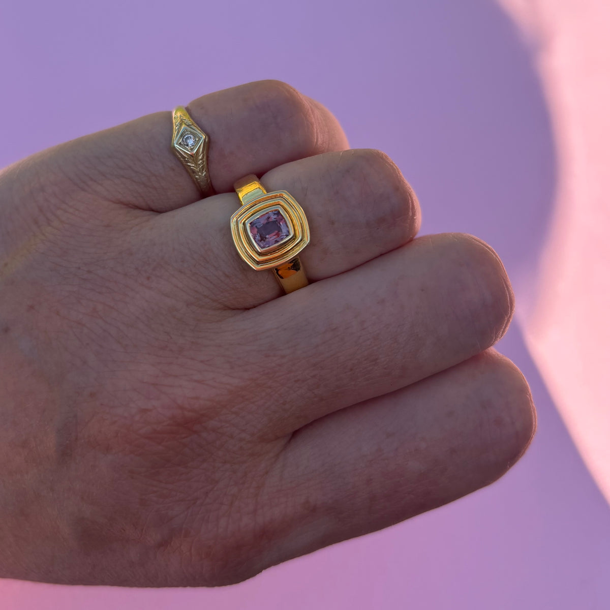 14ct gold plum mauve sapphire bezel set ring