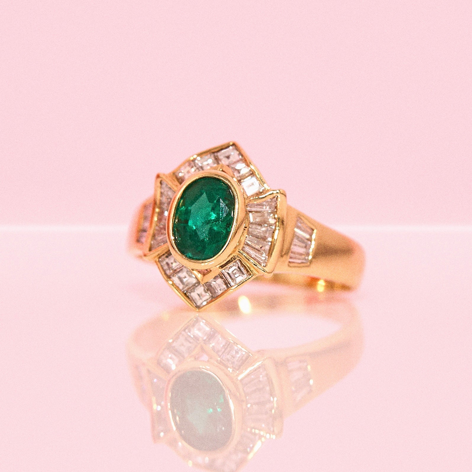 18ct gold emerald and baguette diamond ring