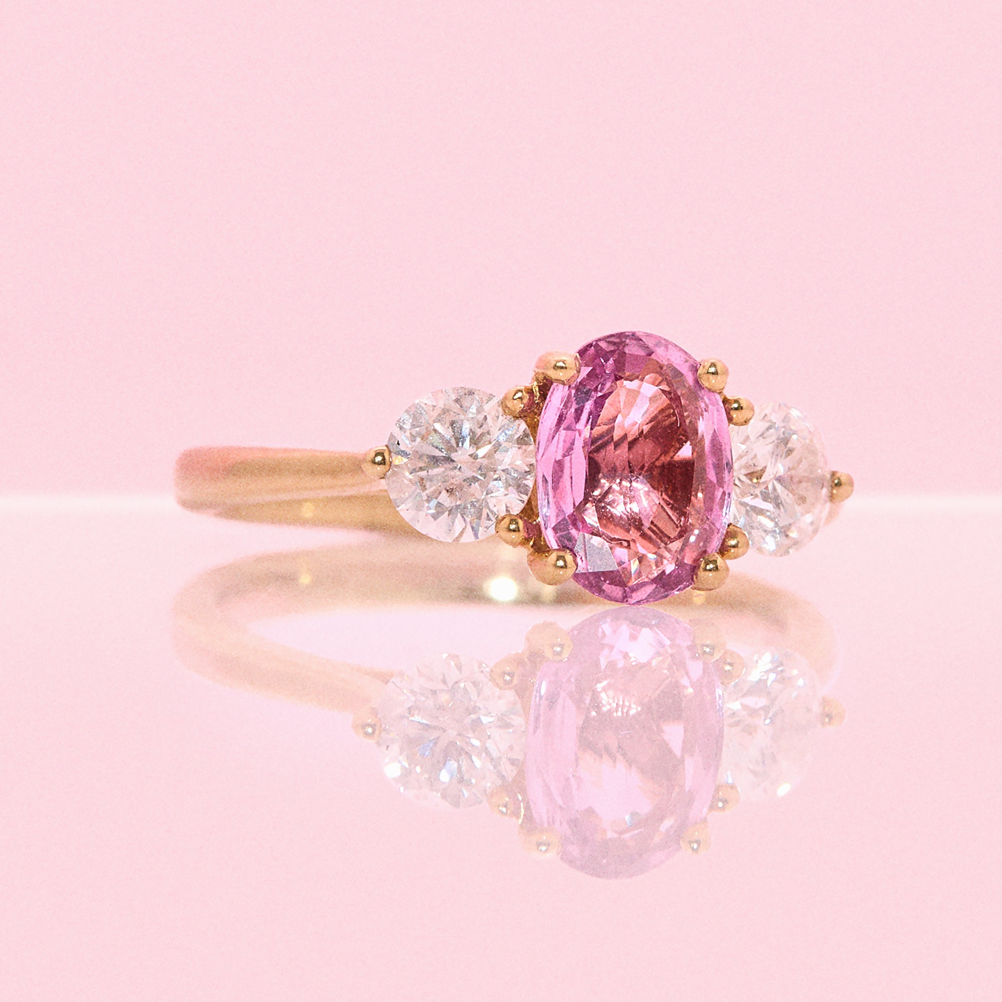18ct gold 1.46ct pink sapphire and 0.84ct diamond three stone ring (made to order)