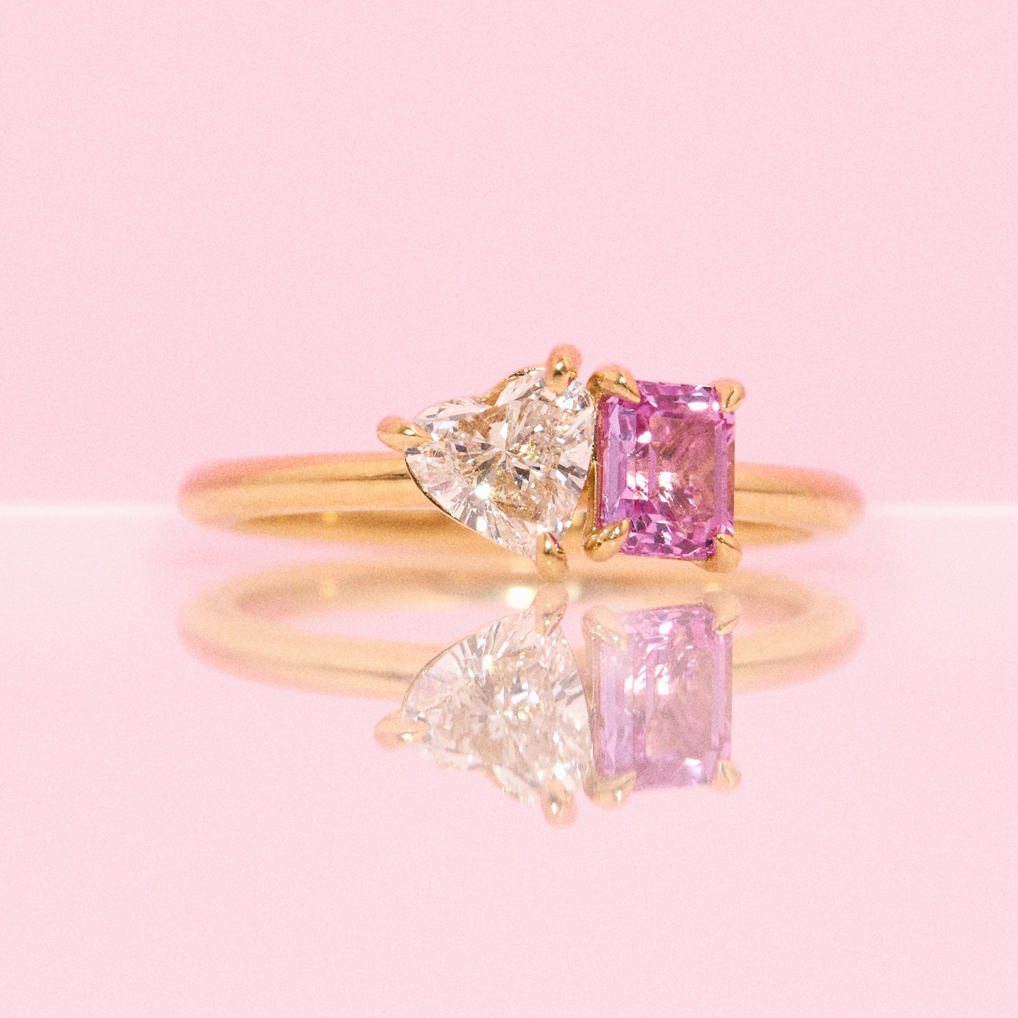 18ct gold ‘toi et moi’ 0.46ct heart-shaped diamond and 0.60ct pink sapphire ring