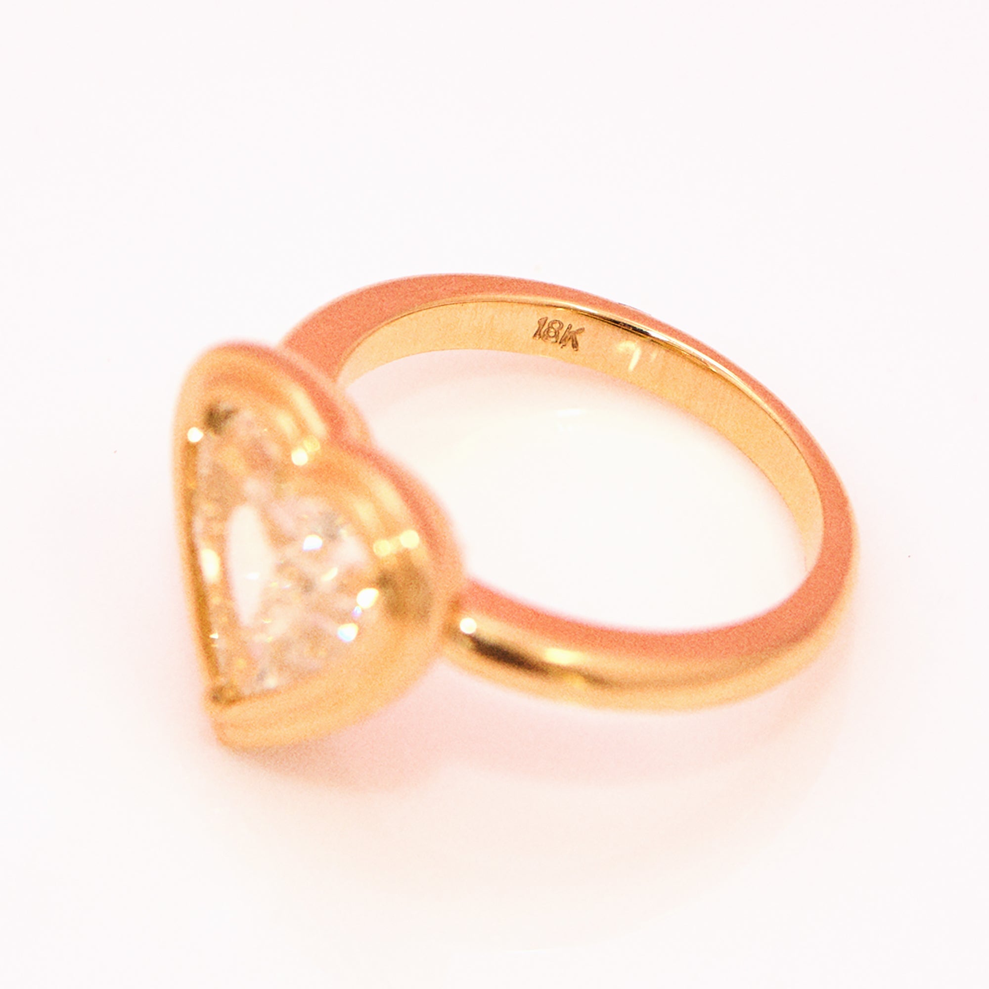 18ct gold bezel set fancy yellow 2.35ct heart-shaped diamond ring