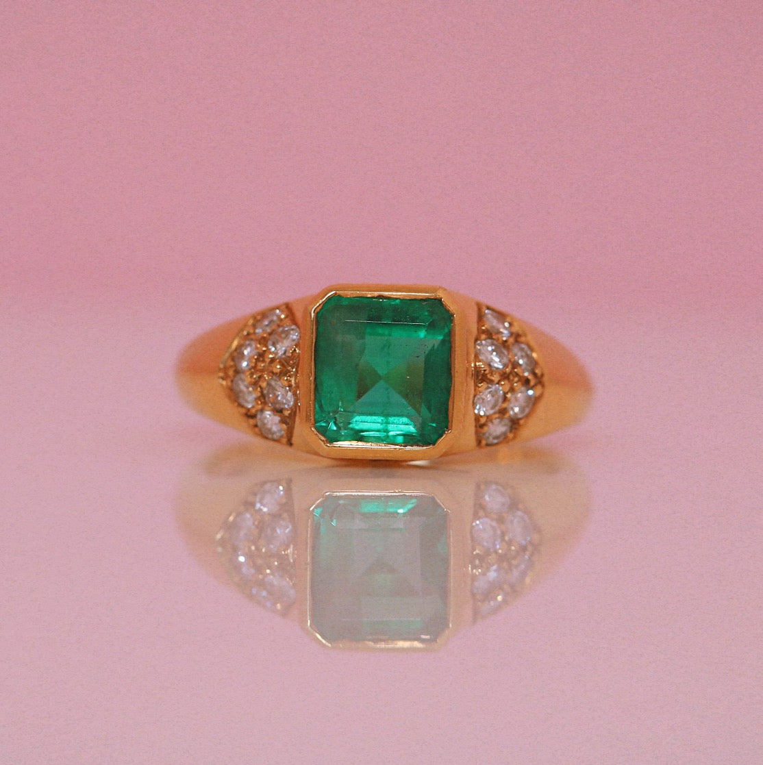 18ct gold emerald and diamond ring
