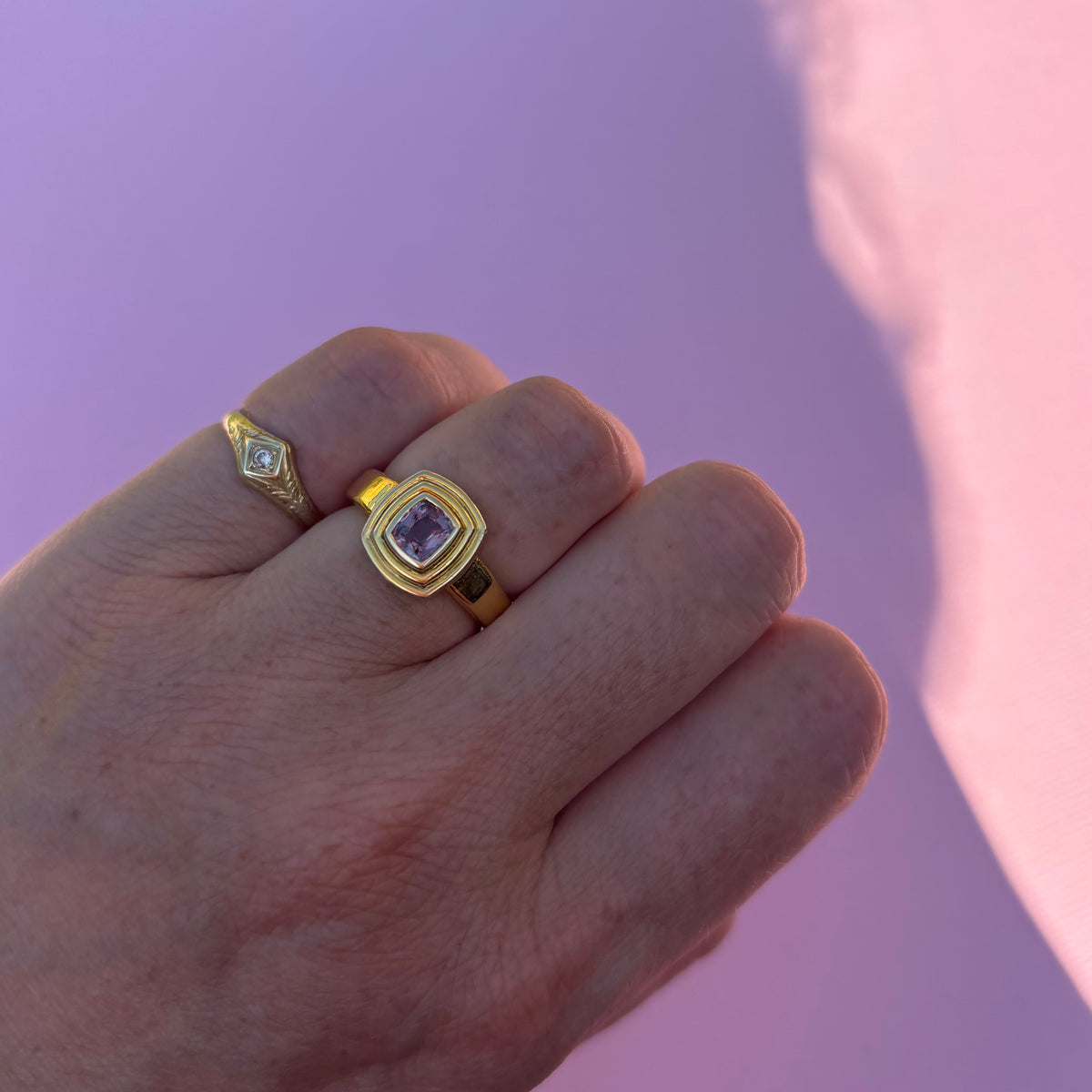 14ct gold plum mauve sapphire bezel set ring