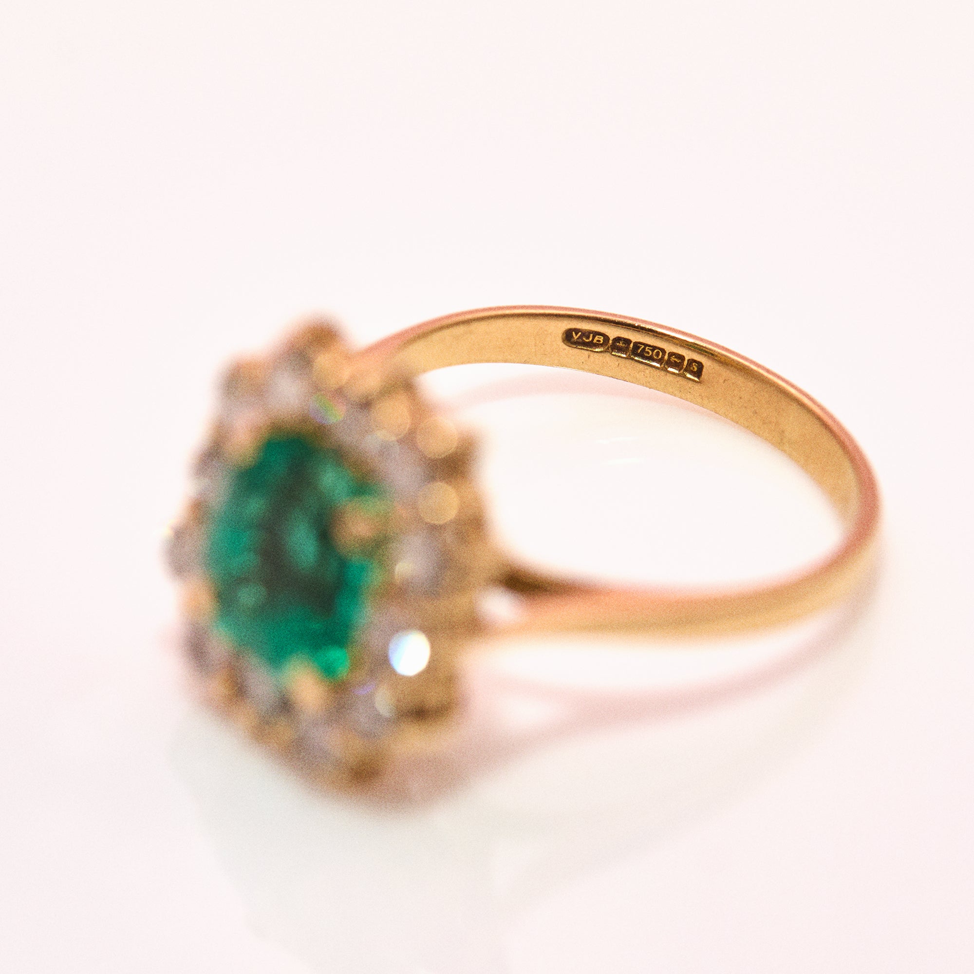 18ct gold emerald and diamond cluster ring