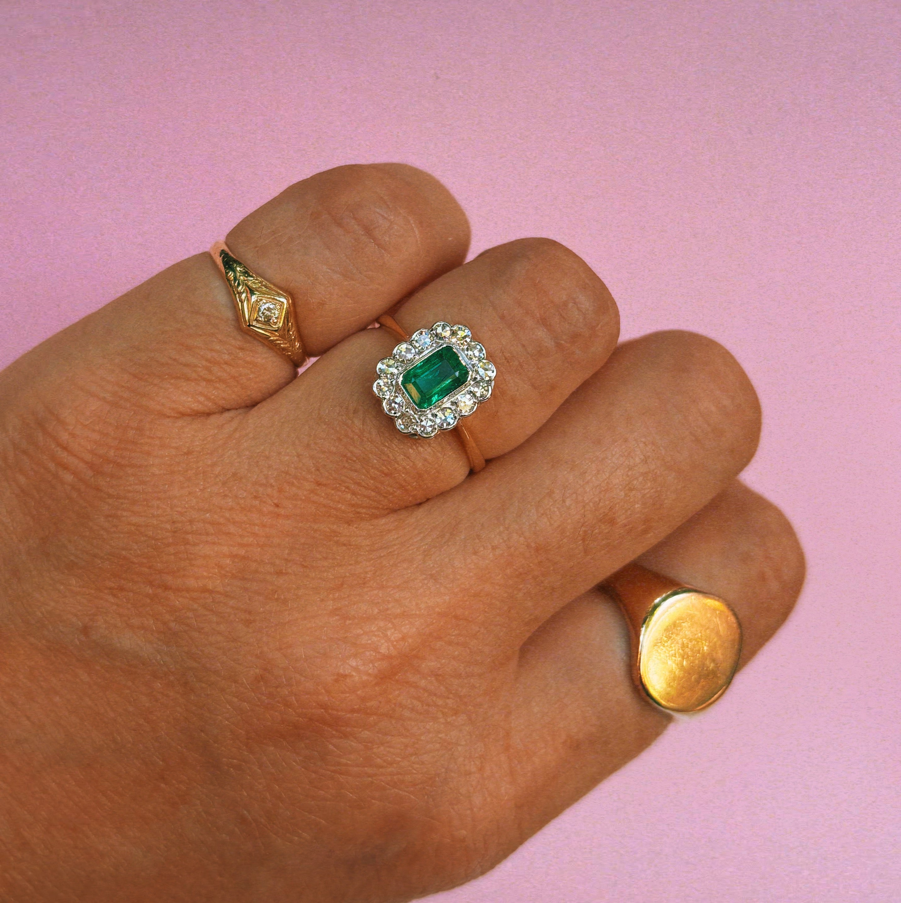 18ct gold emerald and diamond cluster ring