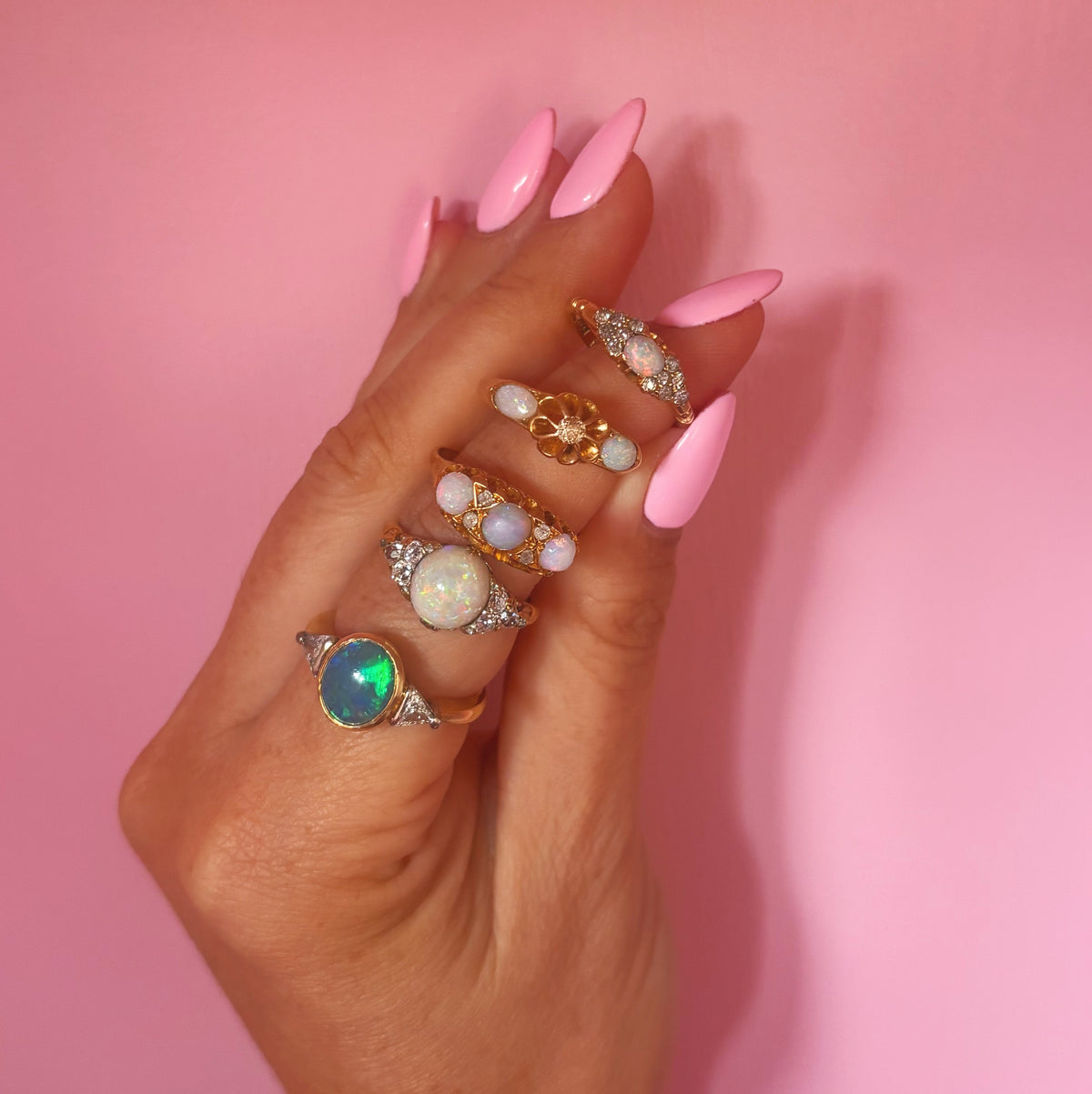 Vintage 18ct gold opal and diamond seven stone ring