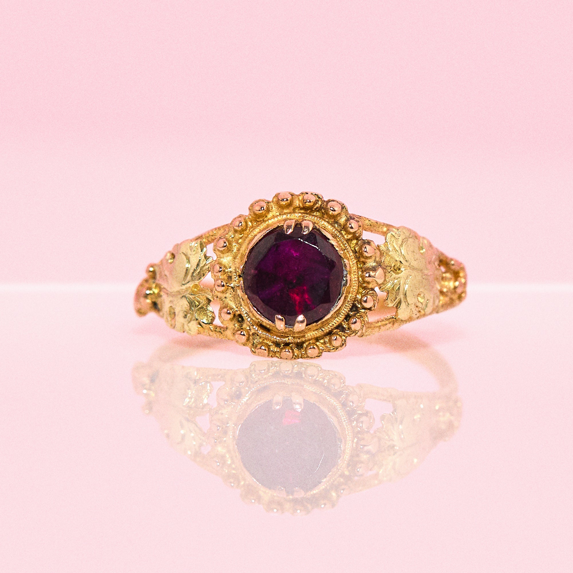 18ct gold almandine garnet ring