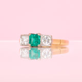 18ct gold emerald and diamond three stone ring