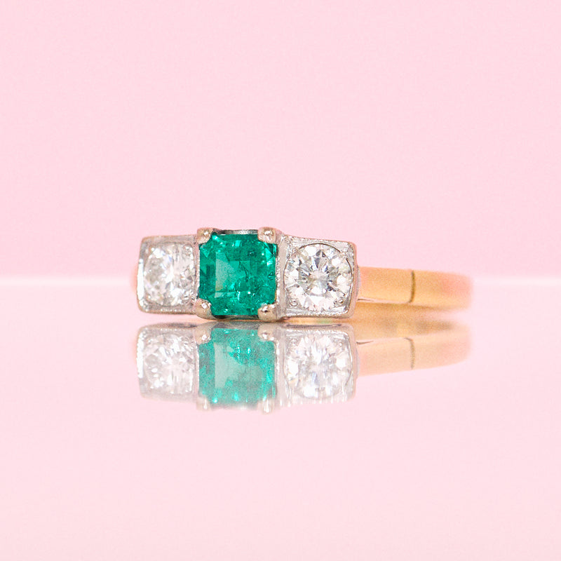 18ct gold emerald and diamond three stone ring