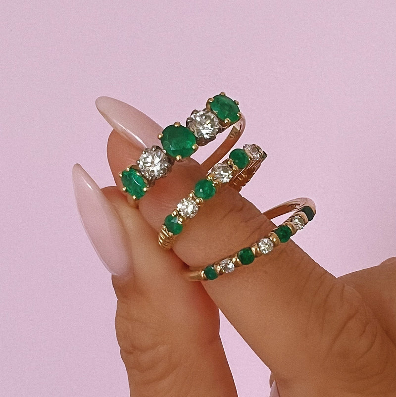 18ct gold emerald and diamond half eternity ring