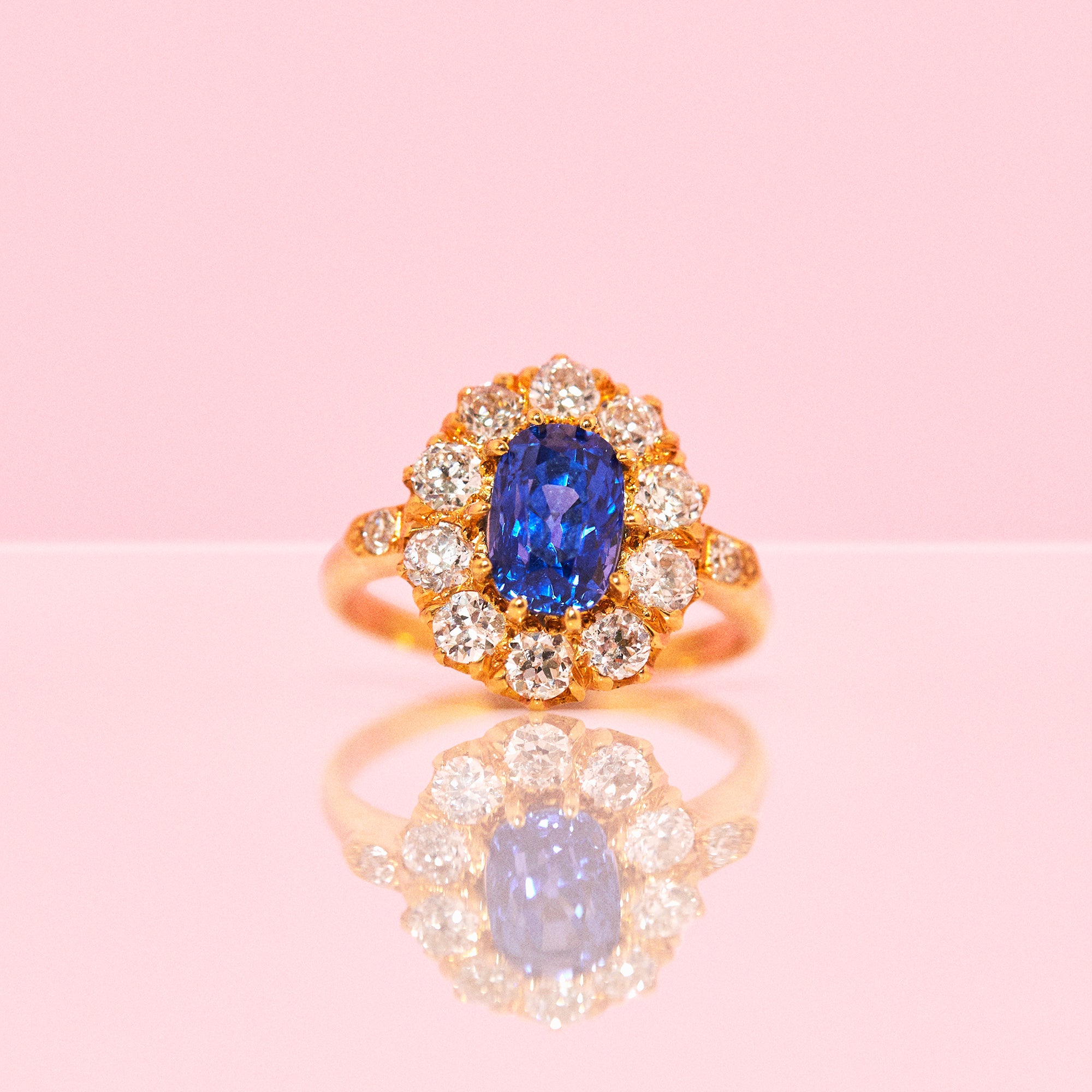 18ct gold sapphire and diamond cluster ring