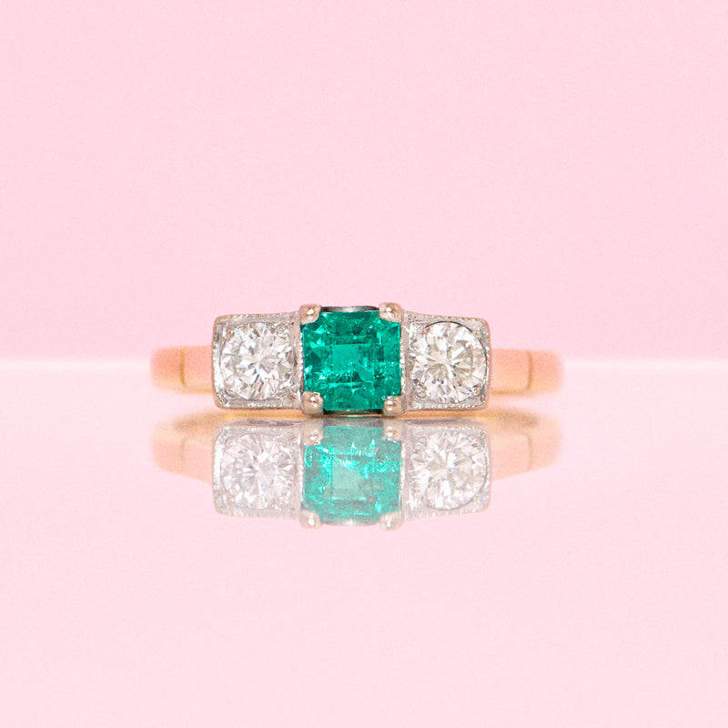 18ct gold emerald and diamond three stone ring