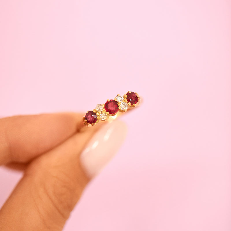 18ct gold ruby and diamond seven stone ring